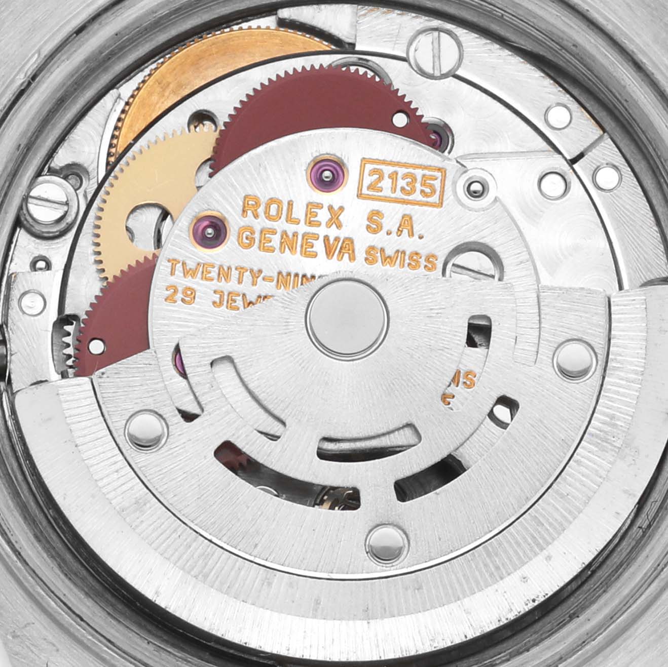 The image shows the movement of a Rolex Datejust 69173 Women's Steel and Gold (two tone) Champagne Dial 69173 Women's Steel and Gold (two tone) Champagne Dial watch, highlighting internal gears and components, viewed from the back.