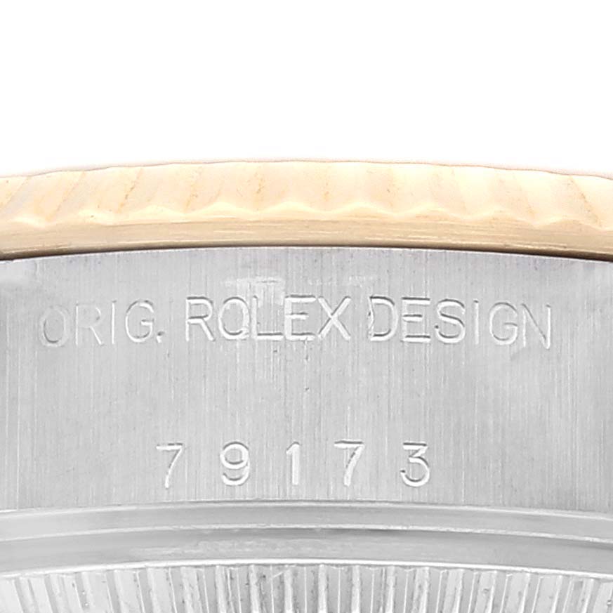 The image shows the case side of a Rolex Datejust 79173 Women's Steel and Gold (two tone) Champagne Dial 79173 Women's Steel and Gold (two tone) Champagne Dial watch, displaying "ORIG. ROLEX DESIGN" and the serial number "79173."