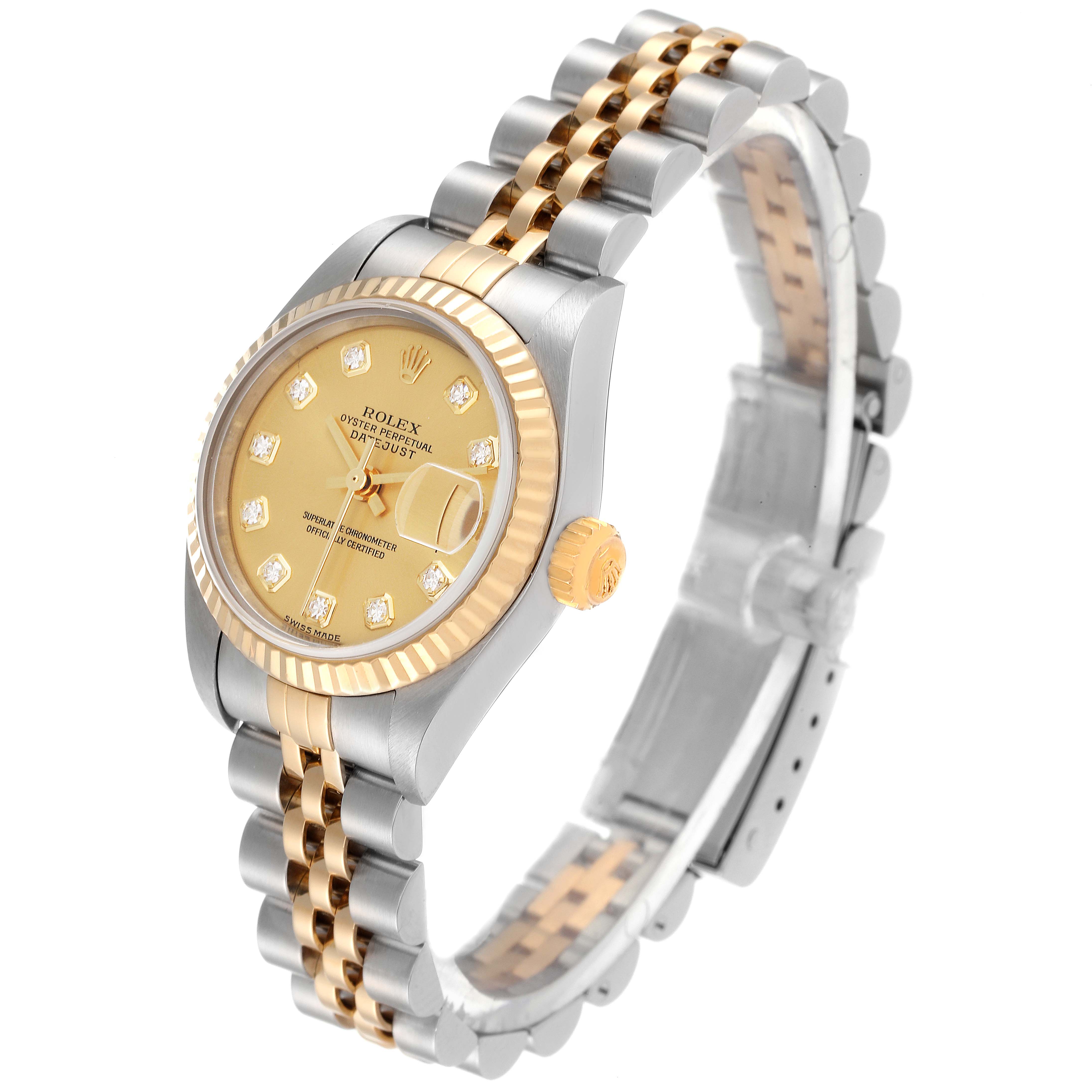 This image shows a Rolex Datejust 79173 Women's Steel and Gold (two tone) Champagne Dial 79173 Women's Steel and Gold (two tone) Champagne Dial watch at an oblique angle, revealing the dial, bezel, crown, and part of the bracelet.