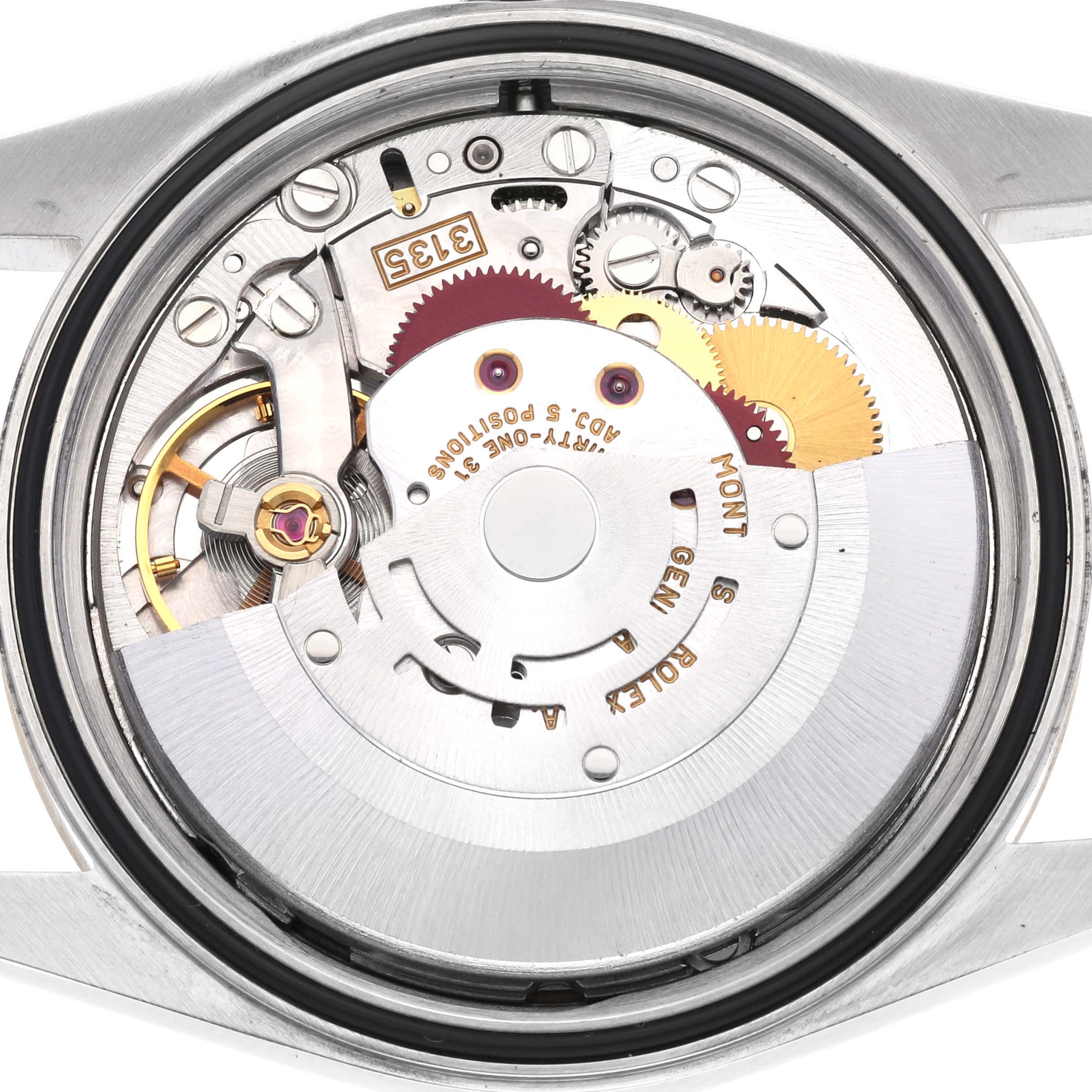 The image shows the movement of a Rolex Datejust 16233 Men
s Steel and Gold (two tone) Champagne Dial 16233 Men
s Steel and Gold (two tone) Champagne Dial, viewed from the back, highlighting its intricate mechanical components.