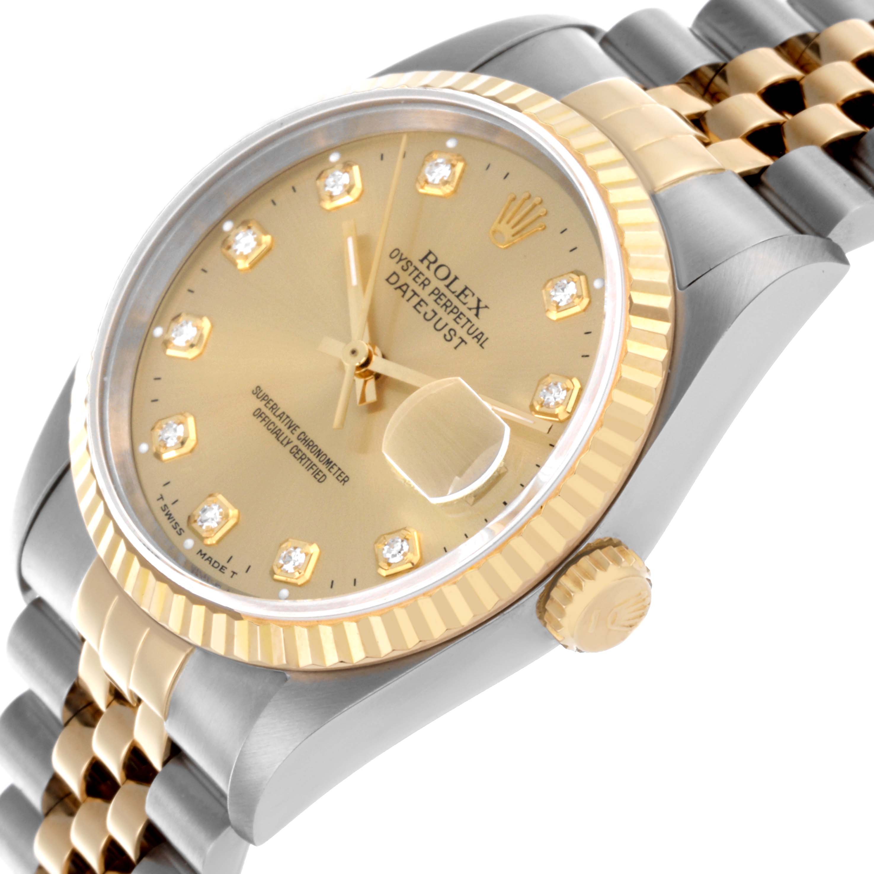 The Rolex Datejust 16233 Men
s Steel and Gold (two tone) Champagne Dial 16233 Men
s Steel and Gold (two tone) Champagne Dial watch is shown at an angle highlighting the dial, bezel, case, crown, and part of the bracelet.