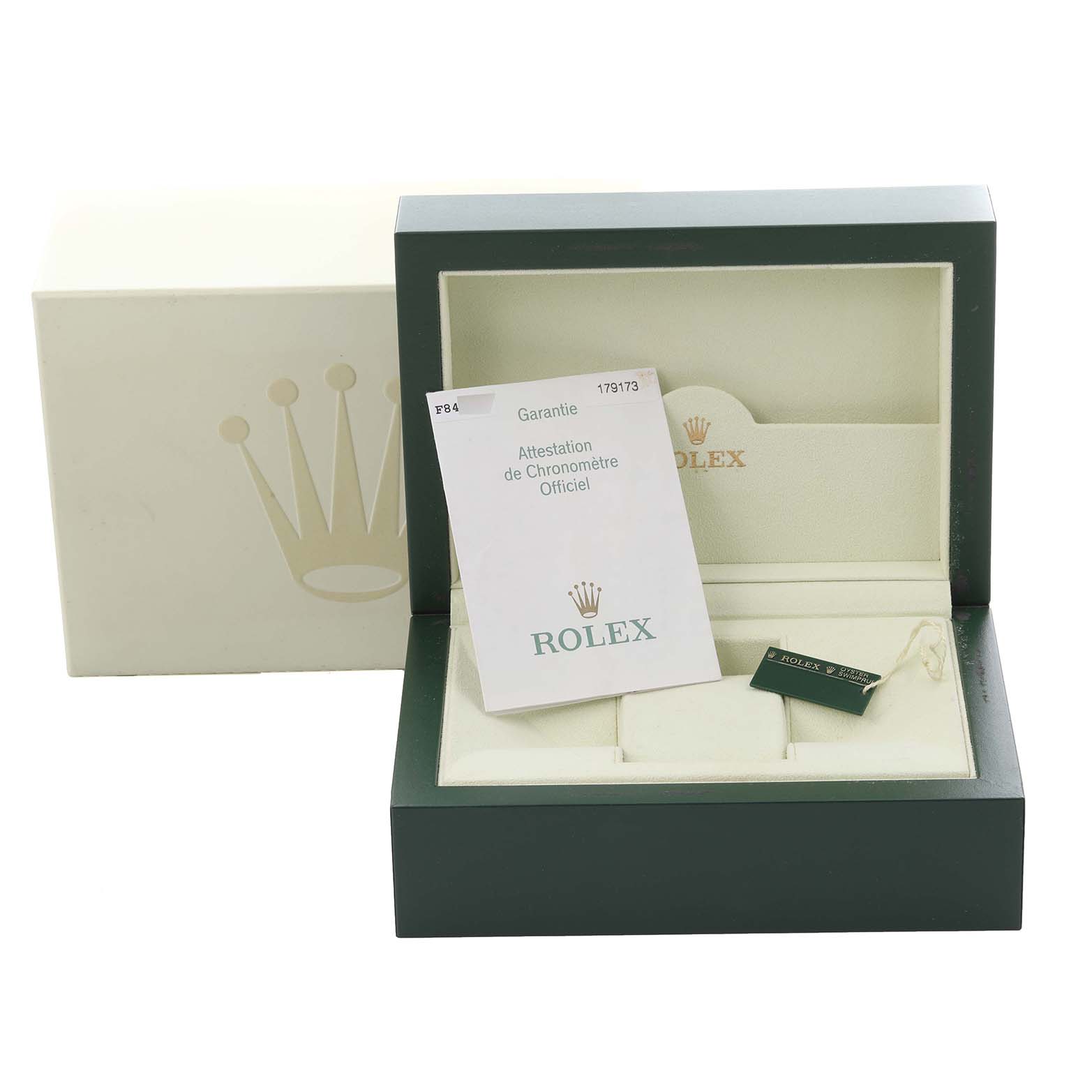 The image shows a Rolex Datejust 179173 Women's Steel and Gold (two tone) Mother of Pearl Dial 179173 Women's Steel and Gold (two tone) Mother of Pearl Dial box with papers and a tag, photographed from the front.