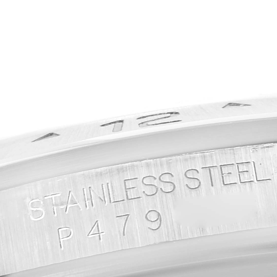 This image shows a close-up of the stainless steel back of a Rolex Explorer 16570 Men's Stainless Steel White Dial 16570 Men's Stainless Steel White Dial watch, with engravings visible.
