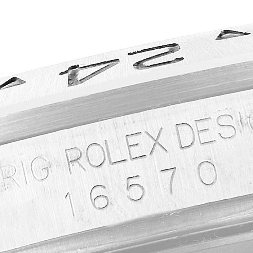 This image shows a close-up of the engraved case side of a Rolex Explorer 16570 Men's Stainless Steel White Dial 16570 Men's Stainless Steel White Dial watch, Model 16570.