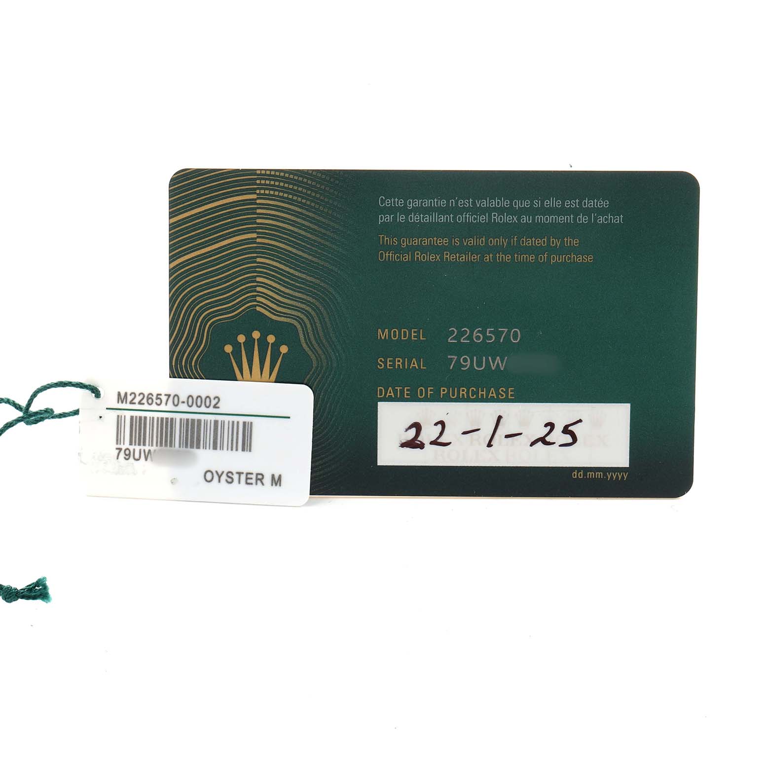 The image shows a green warranty card and a white tag for the Rolex Explorer 226570 Men's Stainless Steel Black Dial model, displaying model and serial numbers.