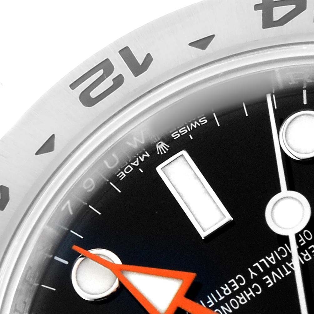 The image shows a close-up of the Rolex Explorer 226570 Men's Stainless Steel Black Dial's dial and bezel, highlighting the hour markers, hands, and part of the chapter ring.