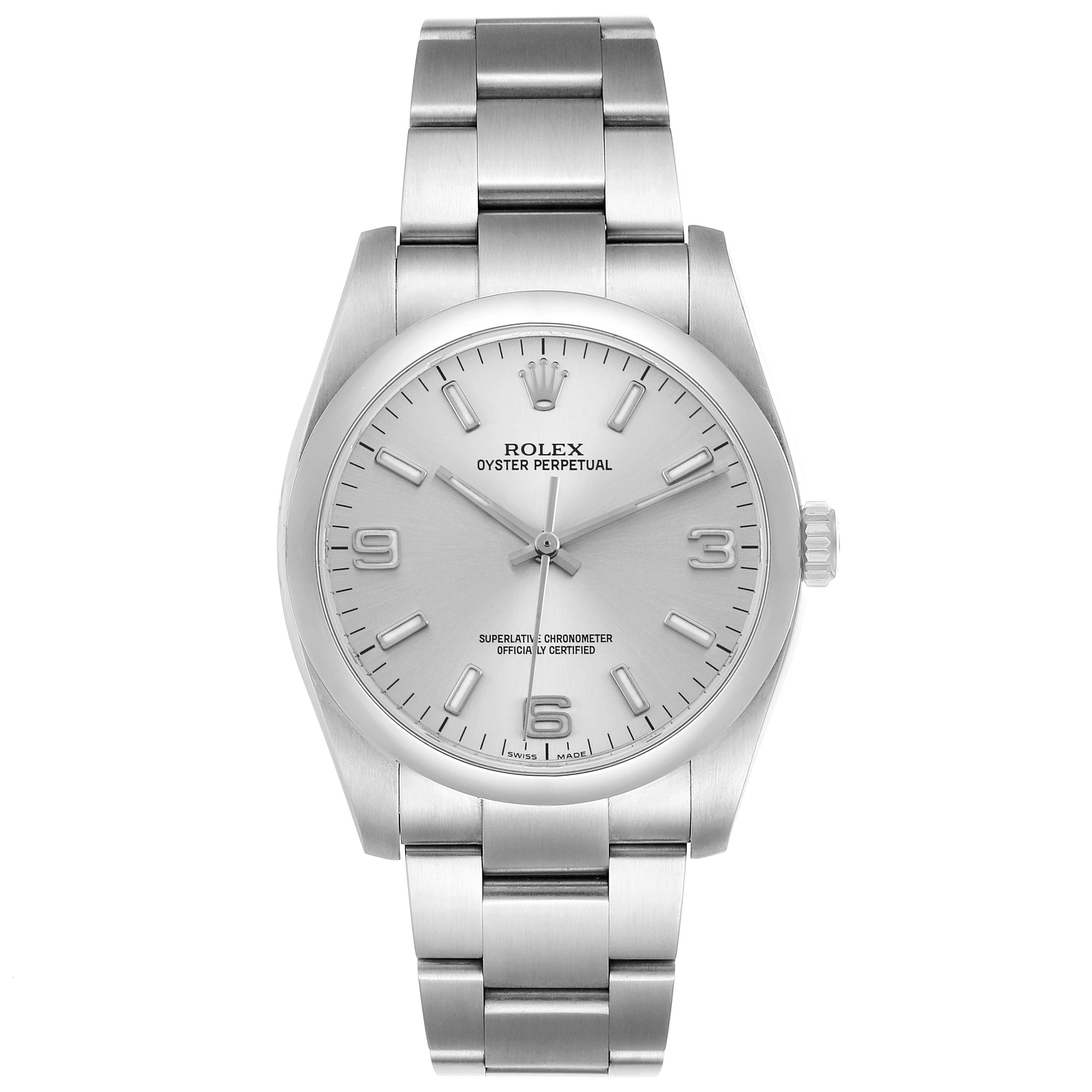 The watch is a Rolex Oyster Perpetual 116000 Men's Stainless Steel Silver Dial shown from a top-down angle, displaying the face, bezel, and bracelet.