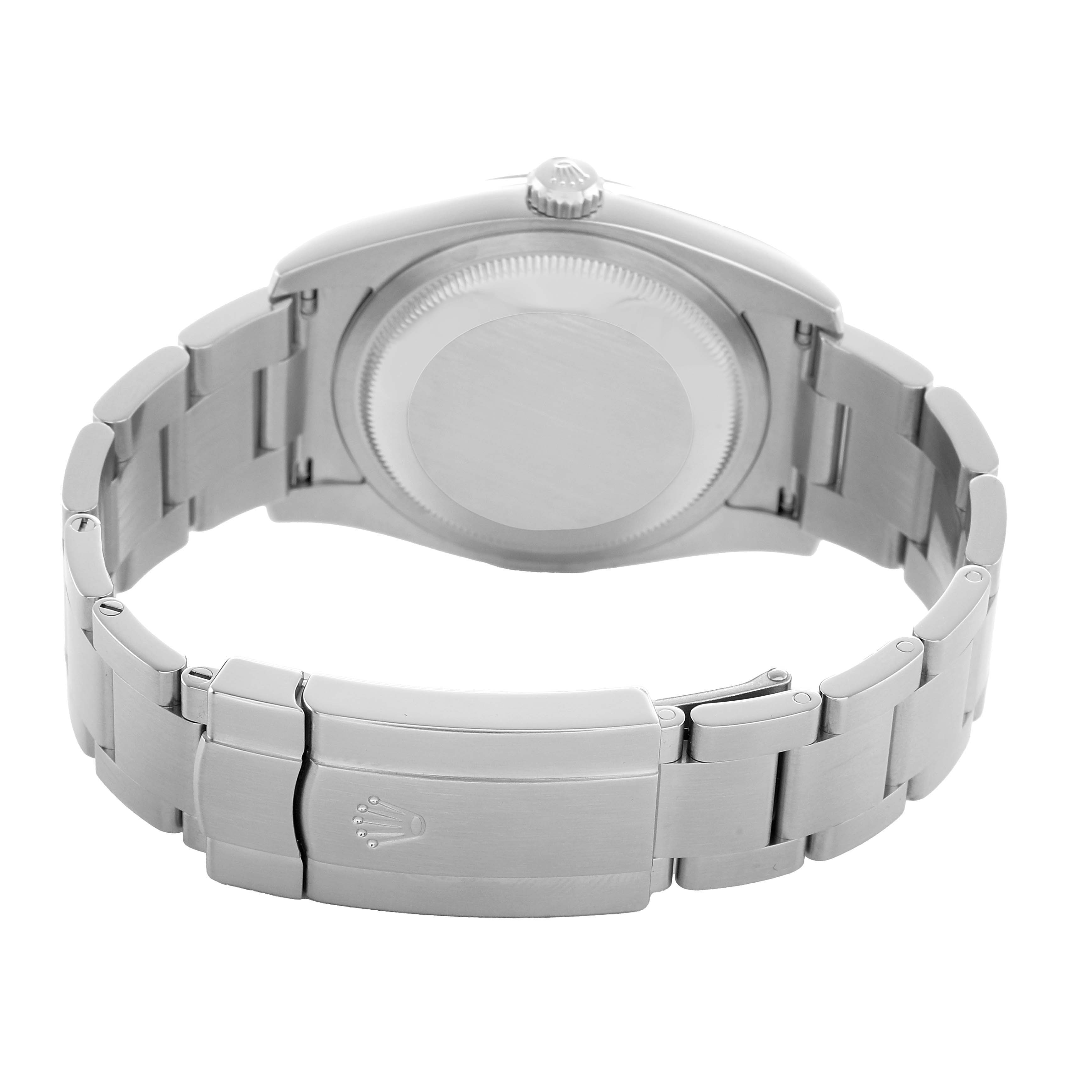 The image shows the back of a Rolex Oyster Perpetual 116000 Men's Stainless Steel Silver Dial watch, highlighting the case back and bracelet clasp.
