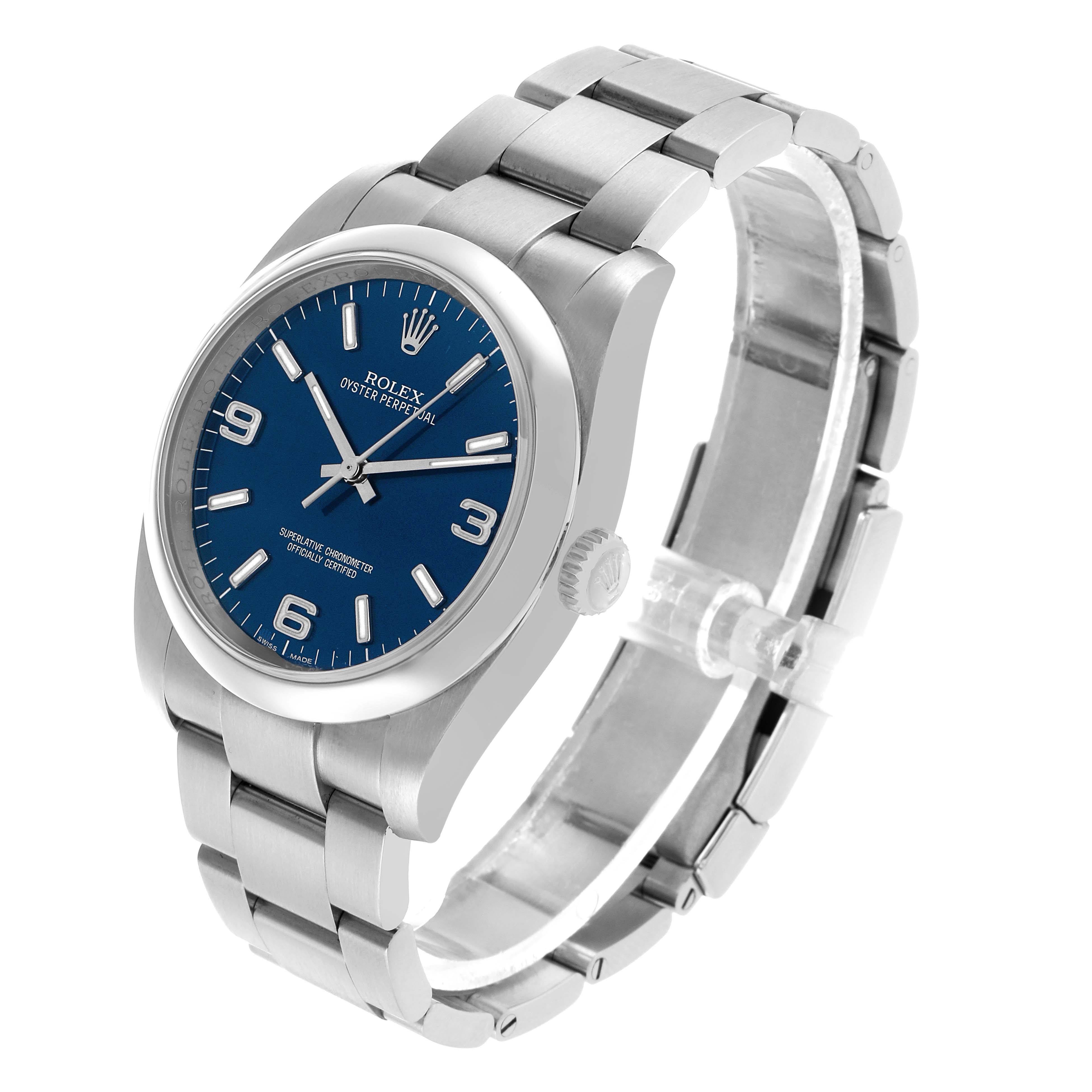 The Rolex Oyster Perpetual 116000 Men's Stainless Steel Blue Dial watch is shown at a slight angle, displaying the blue dial, case, bracelet, and crown.