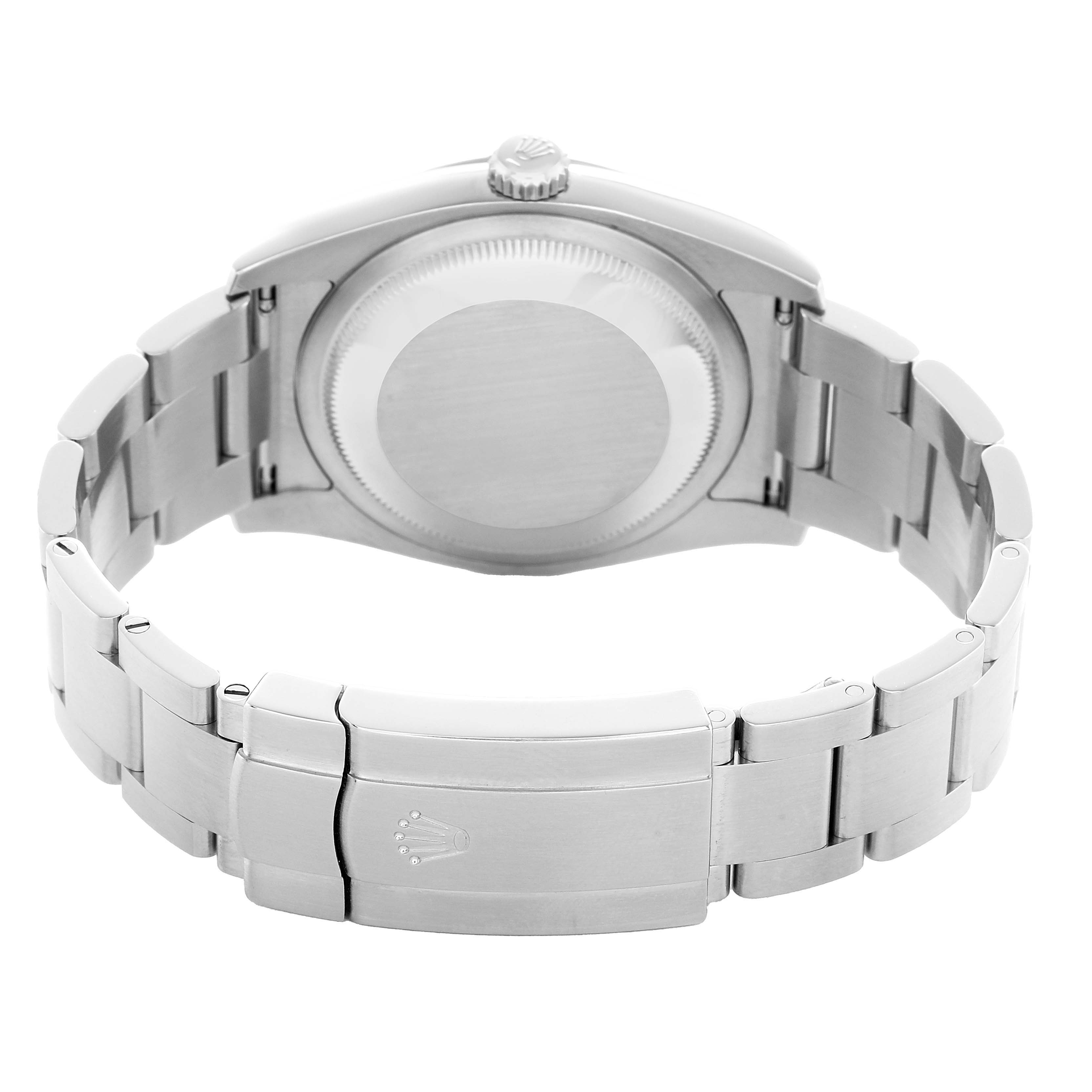 The image shows the back view of a Rolex Oyster Perpetual 116000 Men's Stainless Steel Blue Dial watch, featuring its clasp and bracelet links.