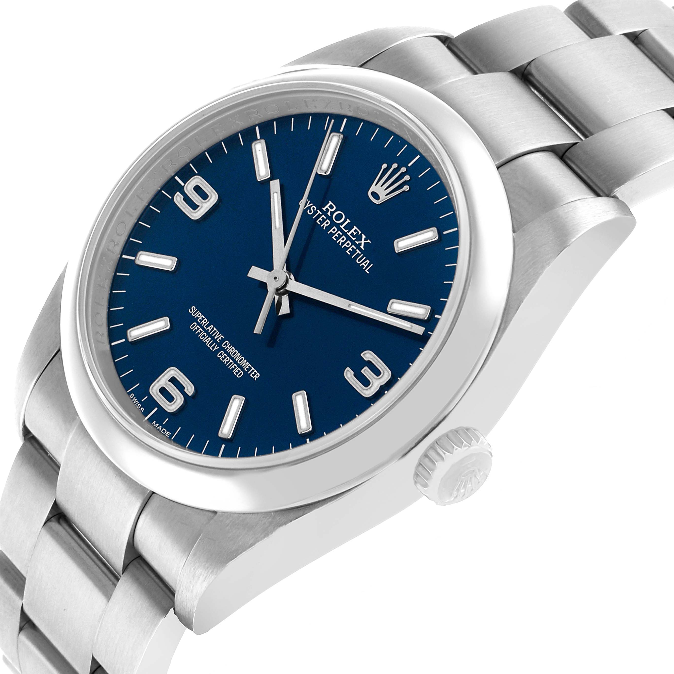 The Rolex Oyster Perpetual 116000 Men's Stainless Steel Blue Dial is shown at a three-quarter angle, displaying the blue dial, bezel, crown, and bracelet.
