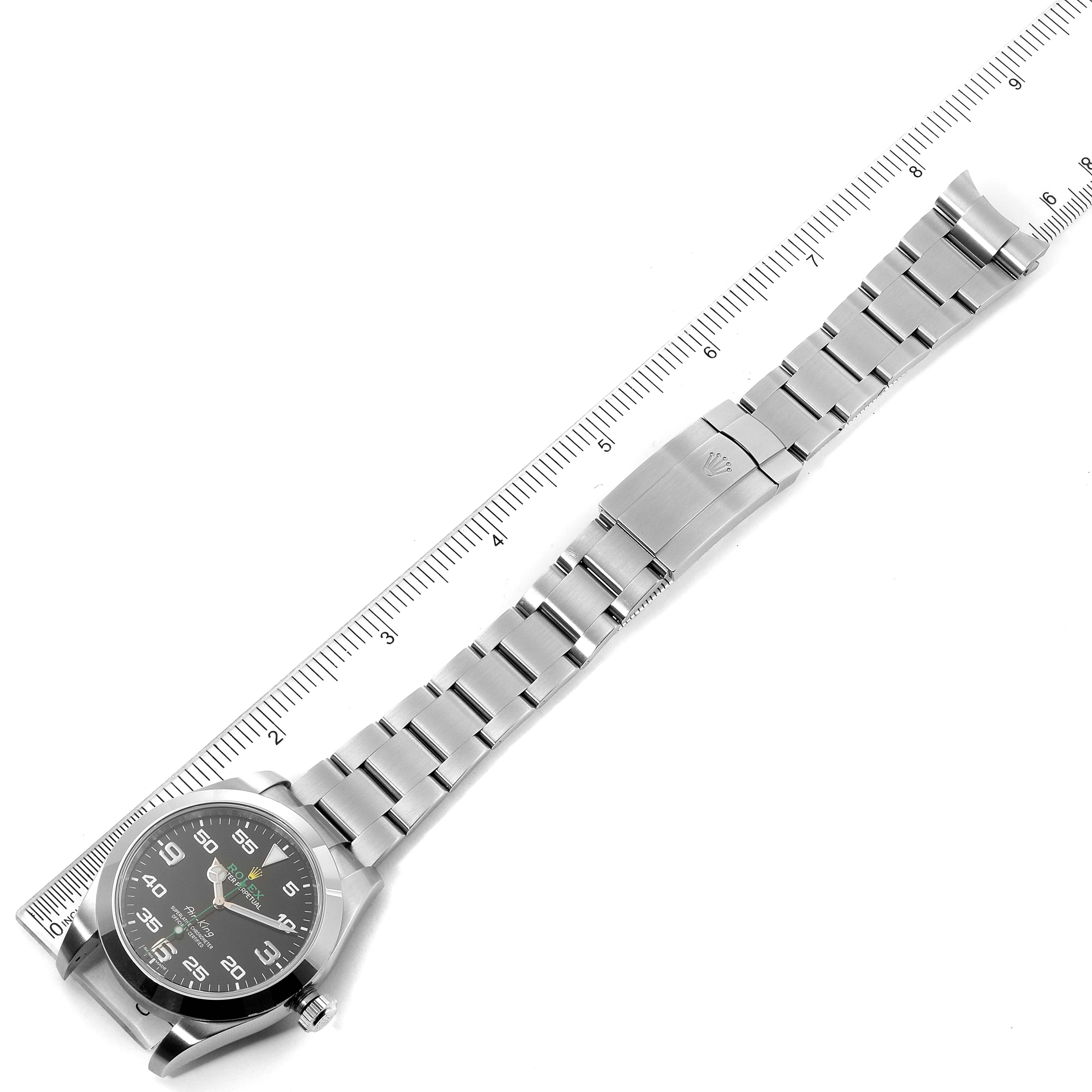 The image shows an overhead view of a Rolex Air-King 116900 Men's Stainless Steel Black Dial 116900 Men's Stainless Steel Black Dial watch, displaying the full length of its bracelet and clasp.