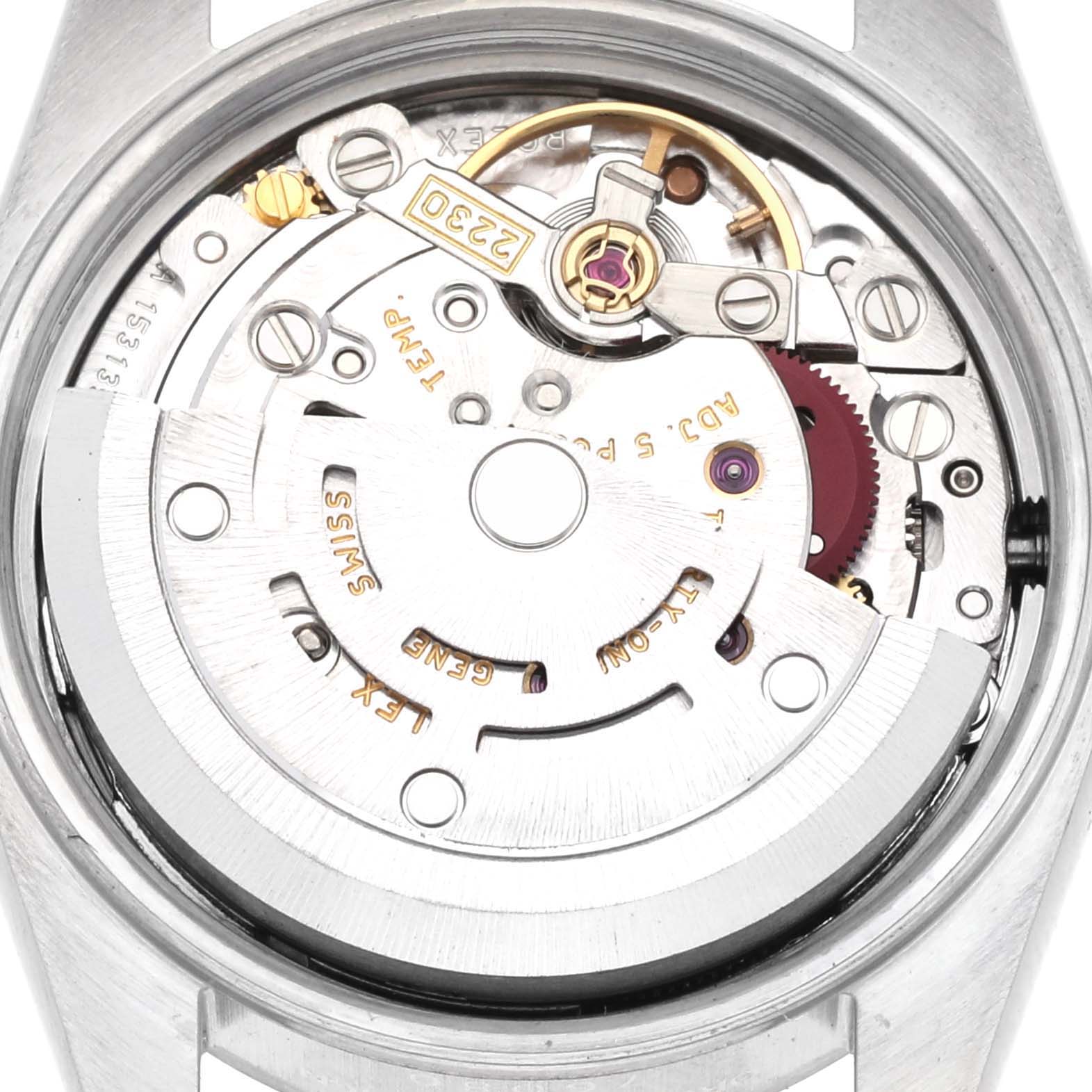 The image shows the movement of a Rolex Oyster Perpetual 76080 Women's Stainless Steel Pink Dial 76080 Women's Stainless Steel Pink Dial watch from the back, highlighting its mechanical components.