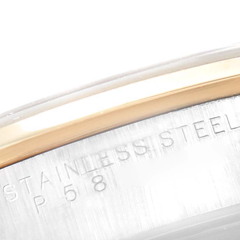 The image shows a close-up of the bezel and case edge of a Rolex Oyster Perpetual 14203 Men's Steel and Gold (two tone) Grey Dial 14203 Men's Steel and Gold (two tone) Grey Dial watch, highlighting the "STAINLESS STEEL" engraving.