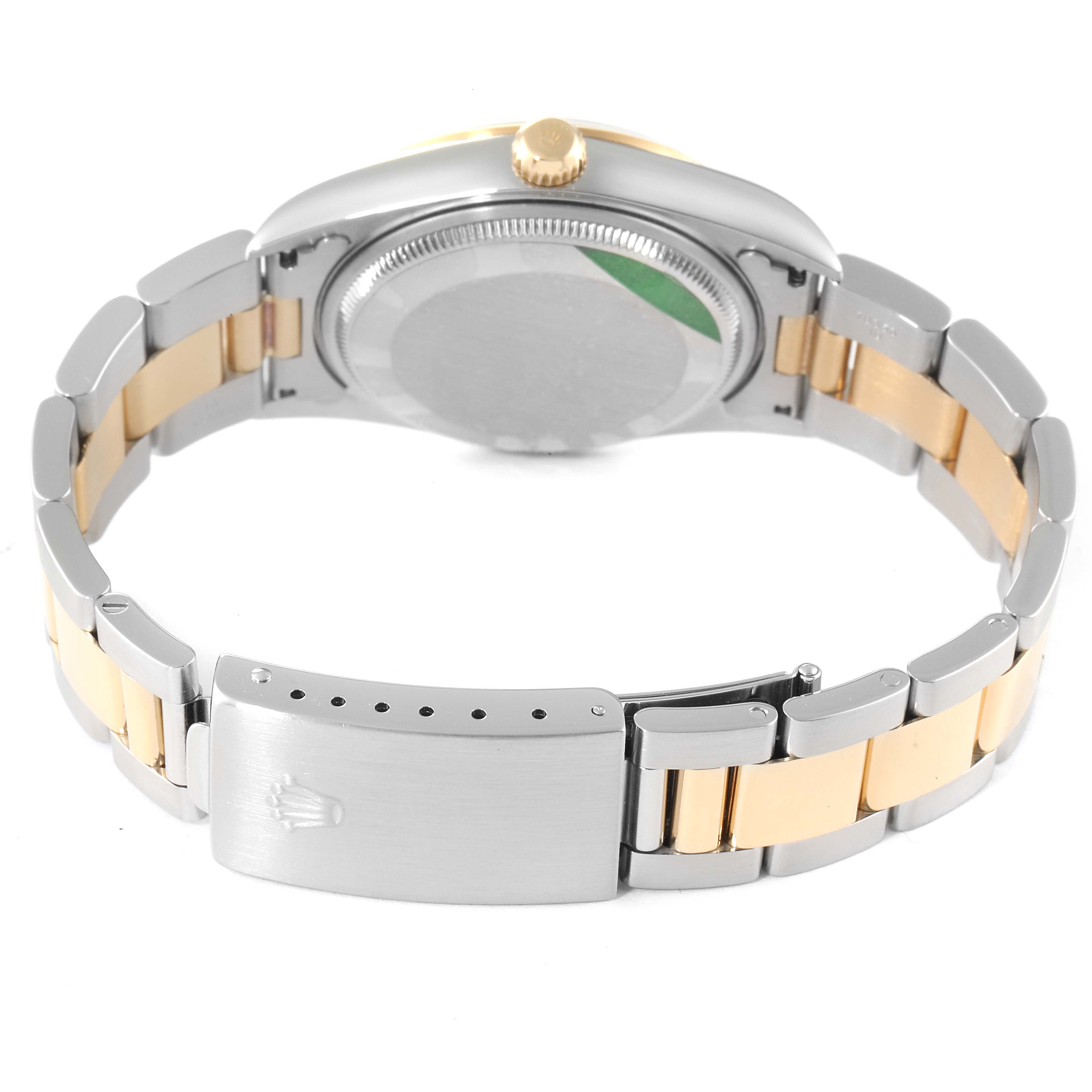 The Rolex Oyster Perpetual 14203 Men's Steel and Gold (two tone) Grey Dial 14203 Men's Steel and Gold (two tone) Grey Dial watch is shown from the back, displaying its clasp, bracelet, and caseback details.