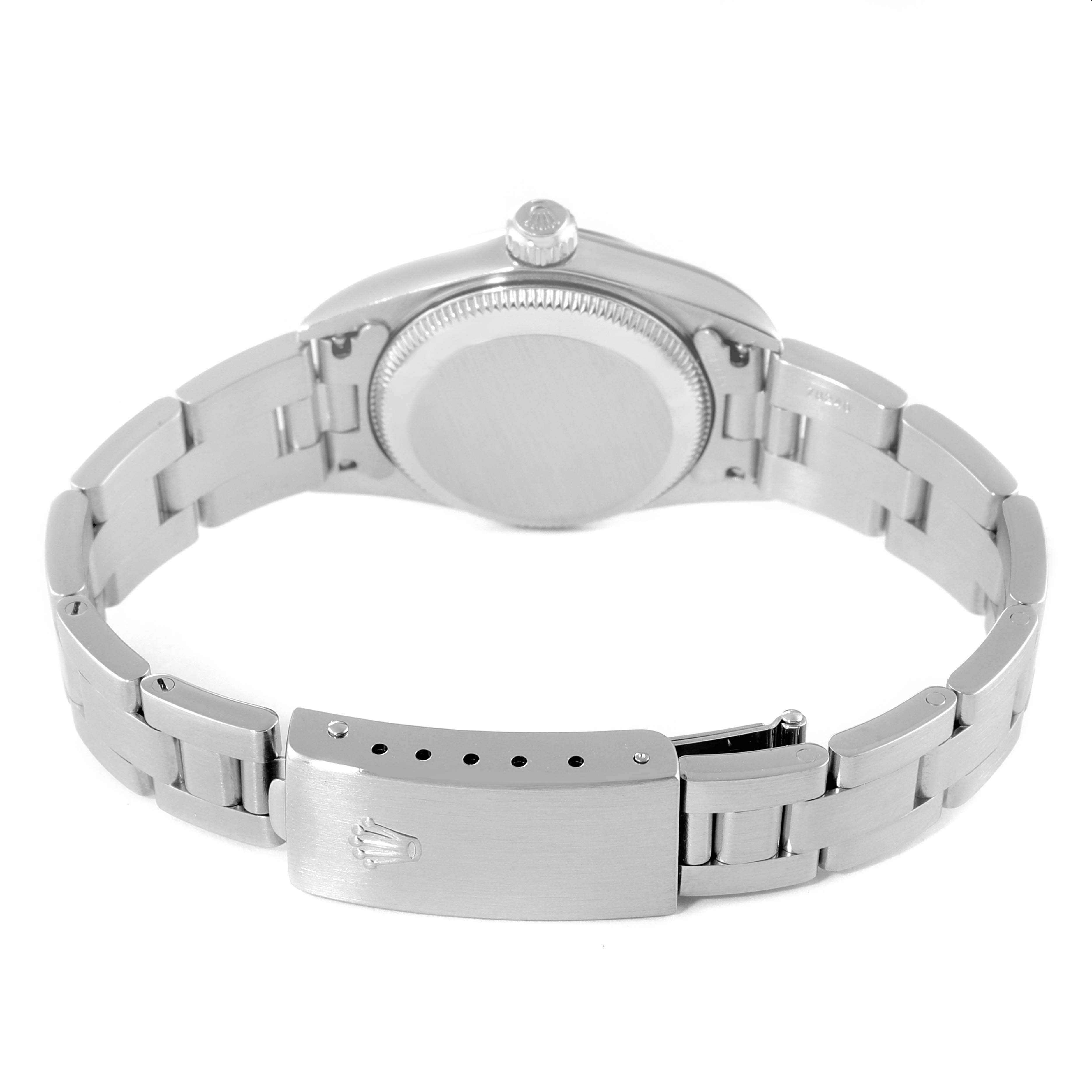 The image shows the back view of the Rolex Oyster Perpetual 76080 Women's Stainless Steel Pink Dial 76080 Women's Stainless Steel Pink Dial watch, focusing on the case back and bracelet.