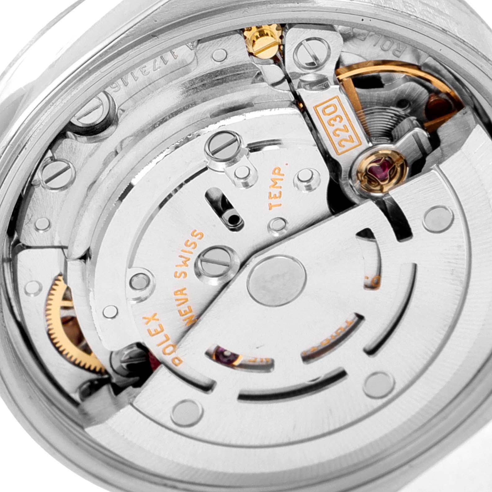 This image shows a close-up view of the movement mechanism inside a Rolex Oyster Perpetual 76080 Women's Stainless Steel Pink Dial 76080 Women's Stainless Steel Pink Dial watch.
