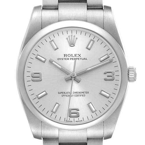 The Rolex Oyster Perpetual 114200 Men's Stainless Steel Silver Dial watch is shown from a front angle, highlighting the dial, bezel, crown, and part of the bracelet.
