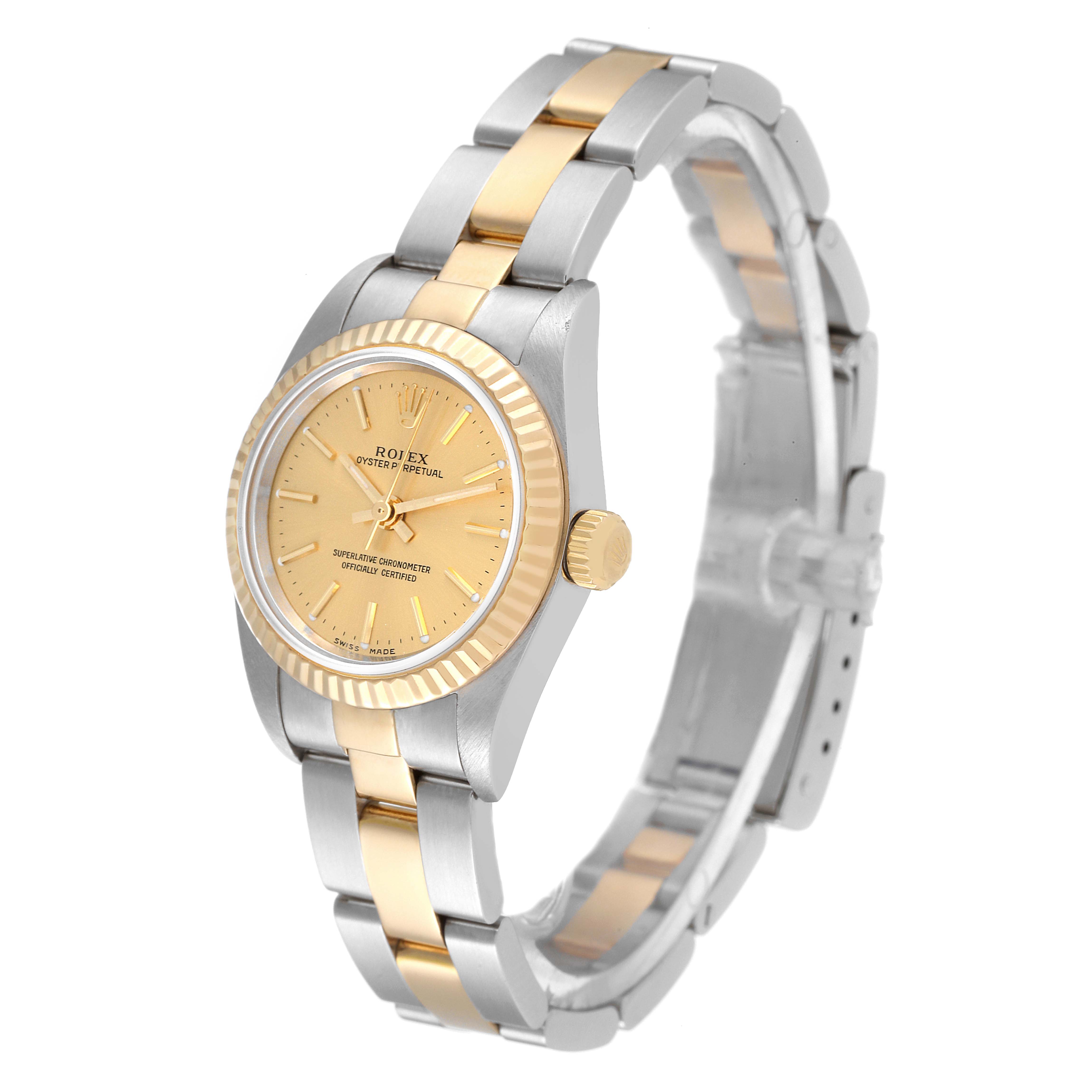 This image shows a Rolex Oyster Perpetual 76193 Women's Steel and Gold (two tone) Champagne Dial 76193 Women's Steel and Gold (two tone) Champagne Dial watch from a side angle, highlighting its bezel, crown, and bi-color metal bracelet.