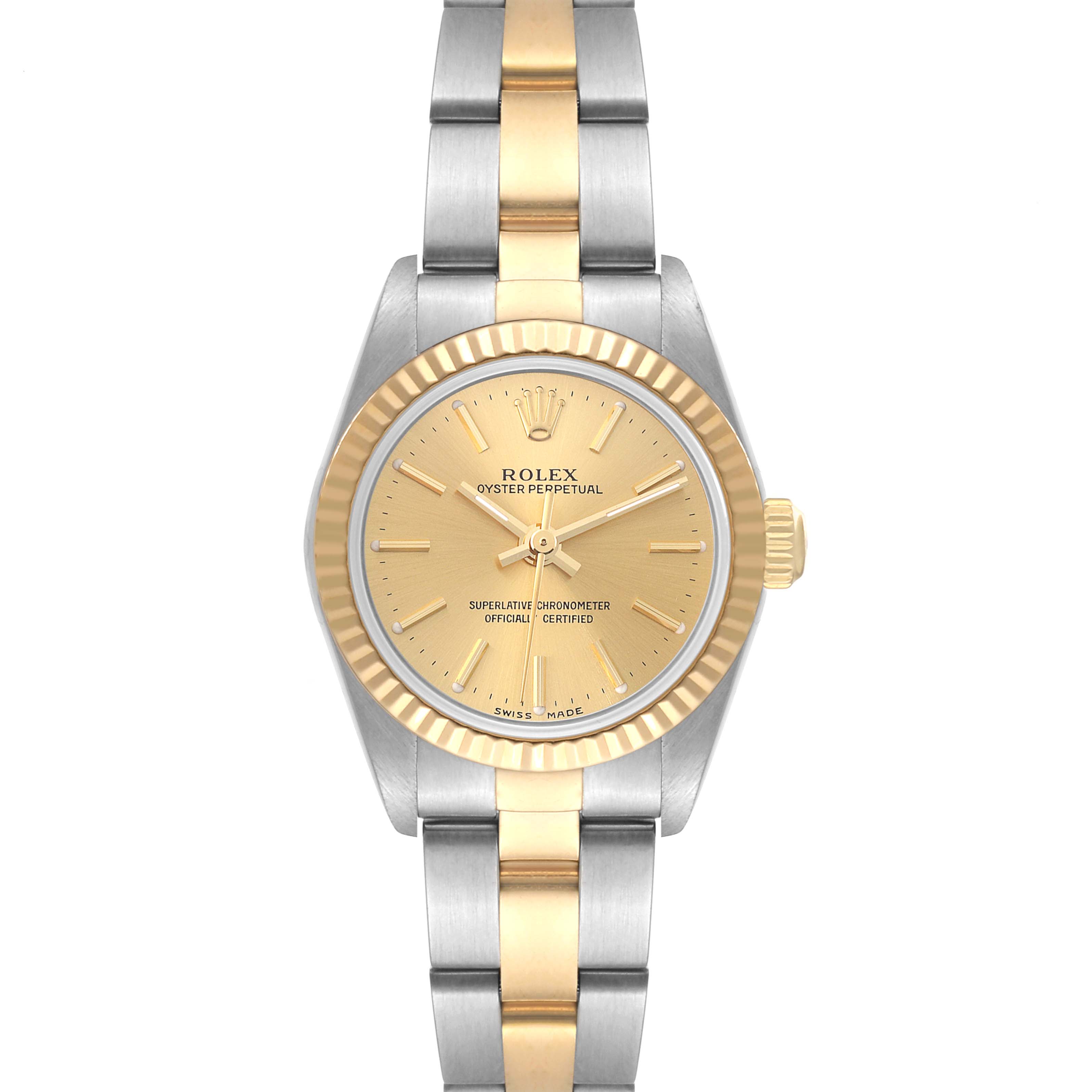 This image shows the front view of a Rolex Oyster Perpetual 76193 Women's Steel and Gold (two tone) Champagne Dial 76193 Women's Steel and Gold (two tone) Champagne Dial watch with a two-tone metal bracelet and a gold dial.