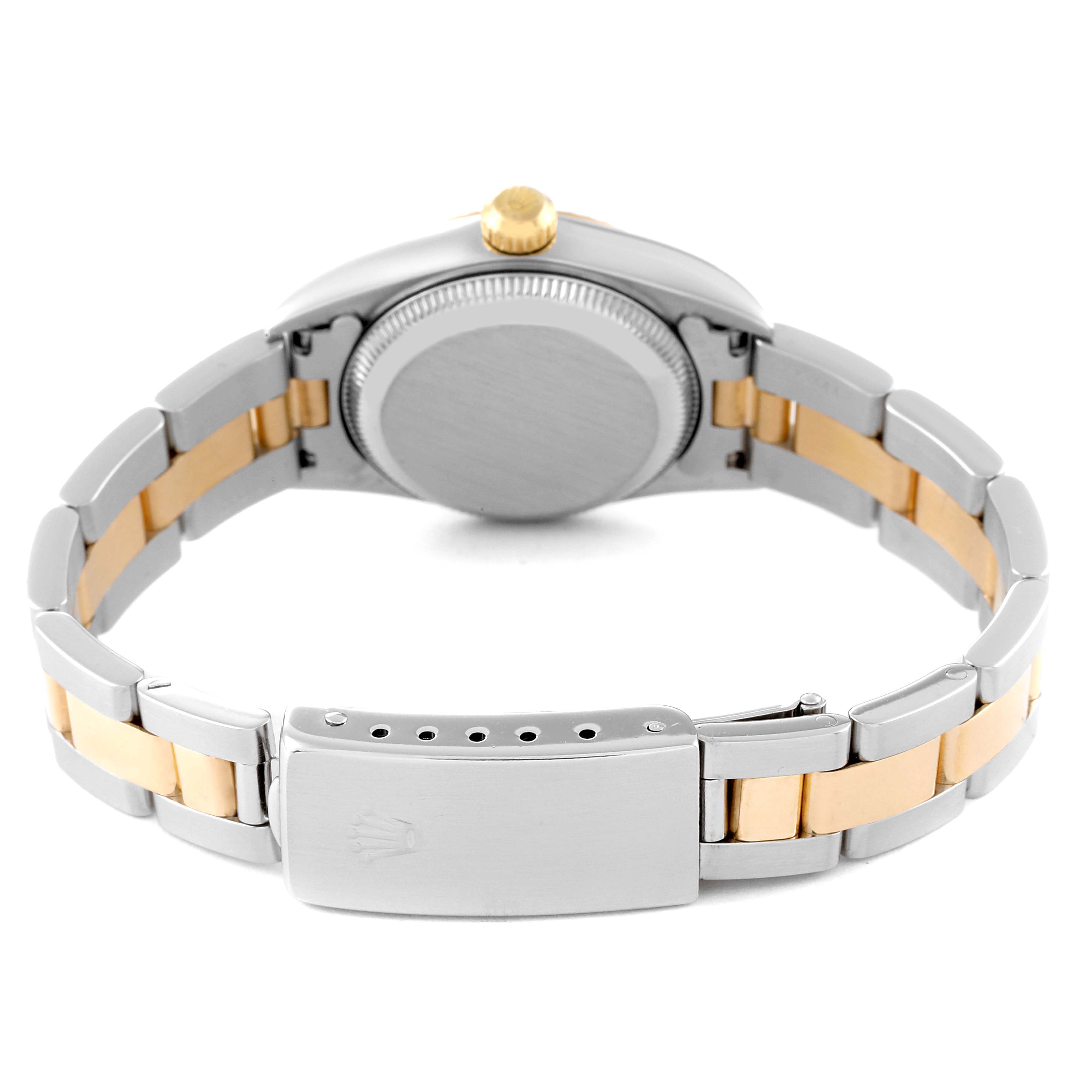 The image shows the case back and bracelet of a Rolex Oyster Perpetual 76193 Women's Steel and Gold (two tone) Champagne Dial 76193 Women's Steel and Gold (two tone) Champagne Dial watch from a rear angle.