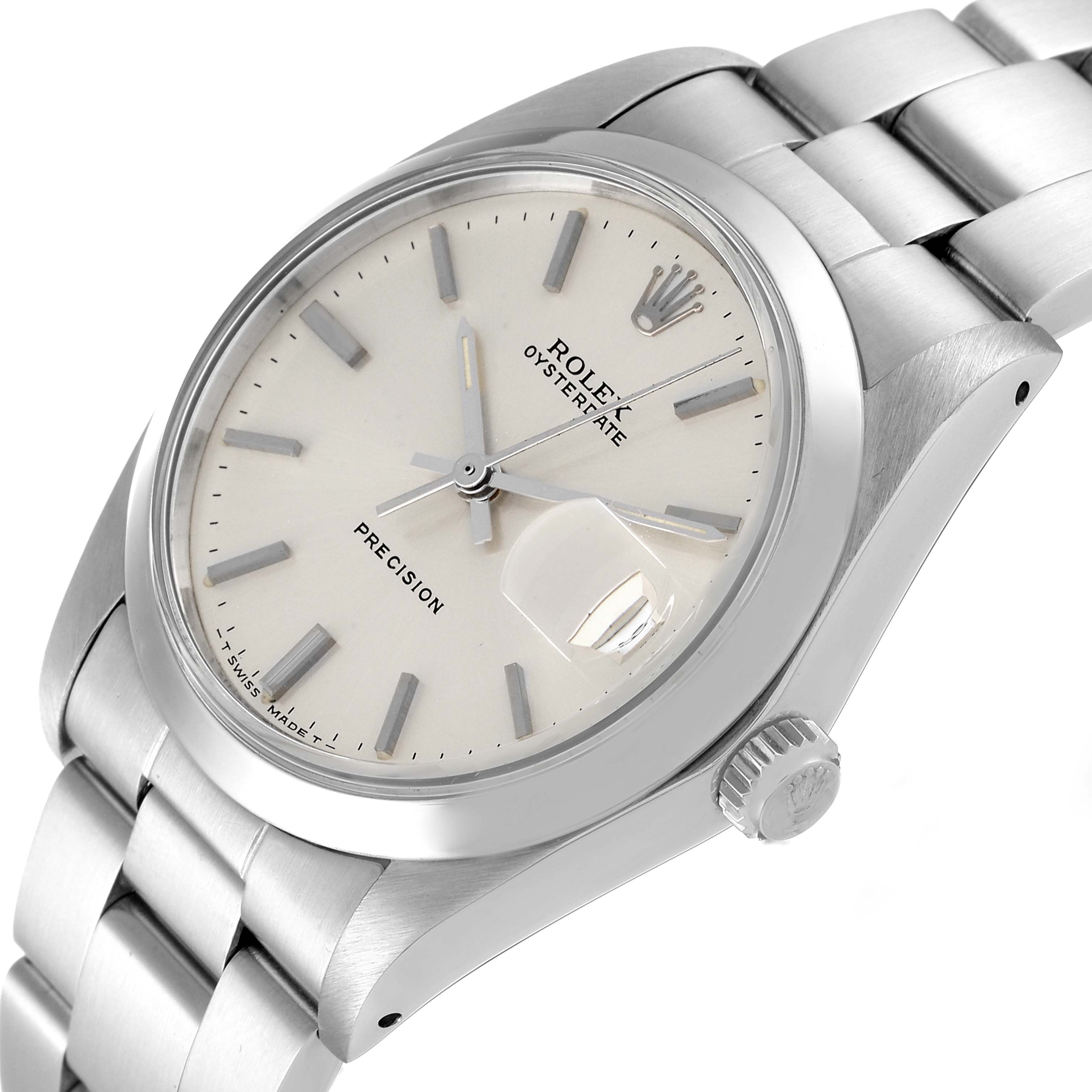 The image shows a Rolex Vintage Collection 6694 Men
s Stainless Steel Silver Dial 6694 Men
s Stainless Steel Silver Dial model watch at a three-quarter angle, highlighting the dial, crown, and part of the bracelet.