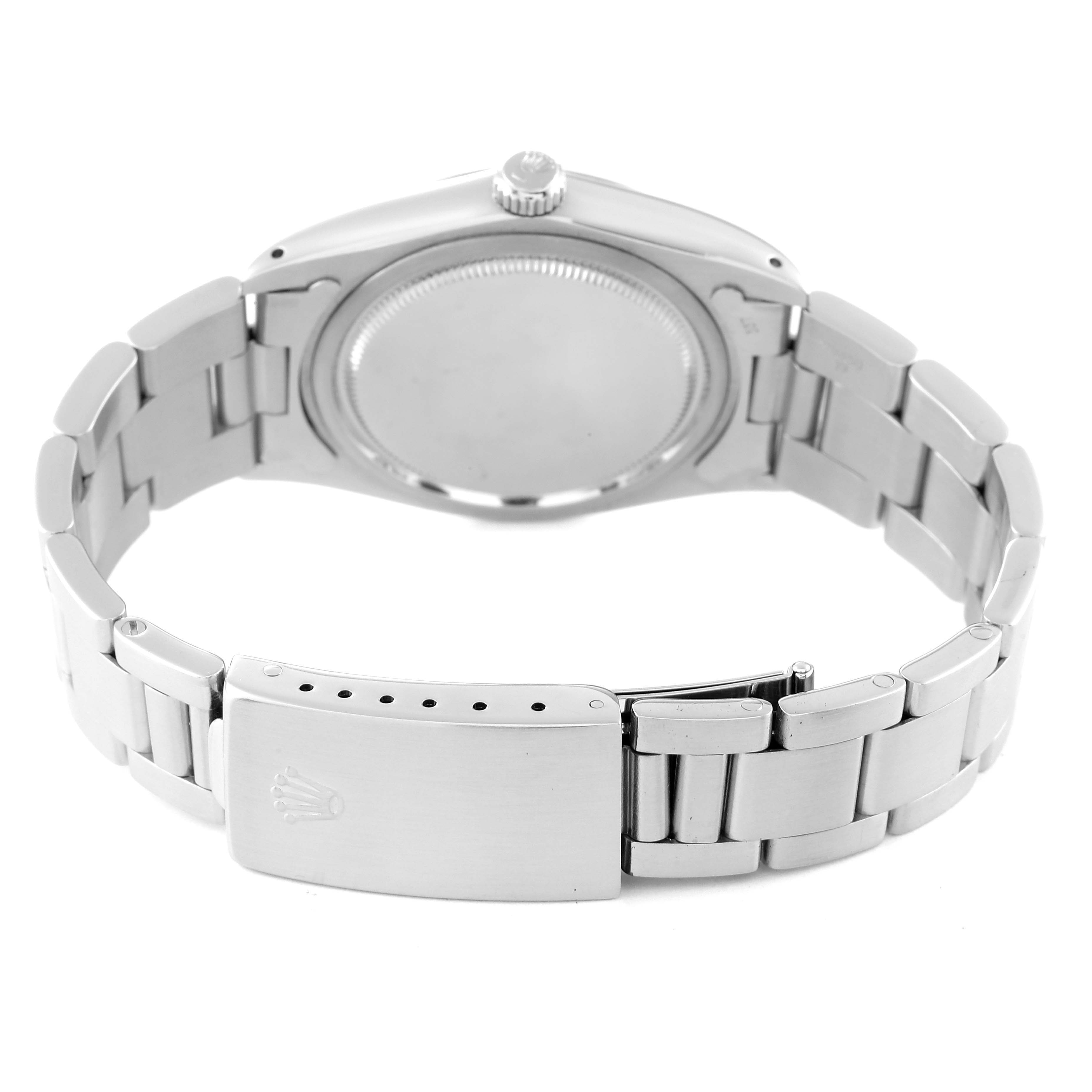 The image shows the back view of a Rolex Vintage Collection 6694 Men
s Stainless Steel Silver Dial 6694 Men
s Stainless Steel Silver Dial model, highlighting the bracelet and clasp.