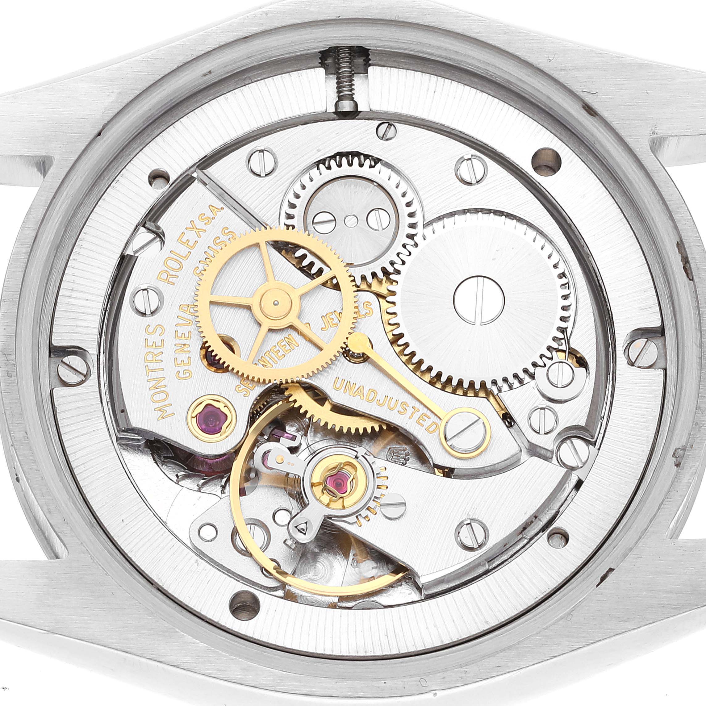 This image shows the inner mechanisms of a Rolex Vintage Collection 6694 Men
s Stainless Steel Silver Dial 6694 Men
s Stainless Steel Silver Dial watch viewed from the back, highlighting gears and components.