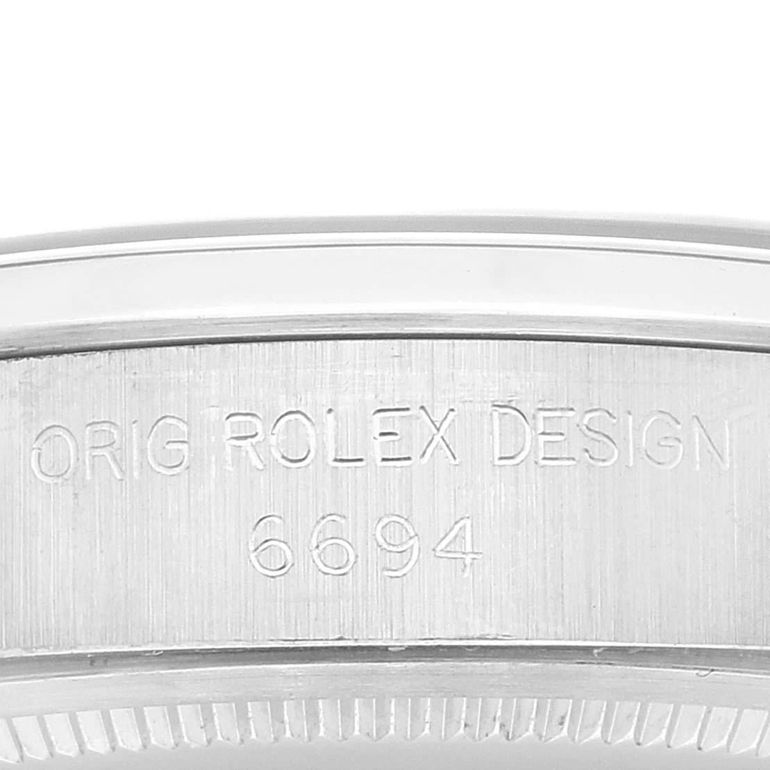 The image shows a close-up of the side casing with engravings on the Vintage Collection model by Rolex.