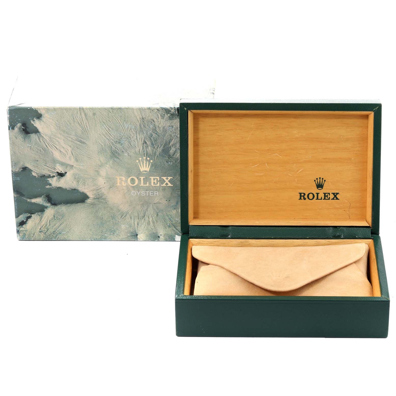 This image shows the open box and protective pouch for the Vintage Collection model by Rolex, with branding visible on the case.