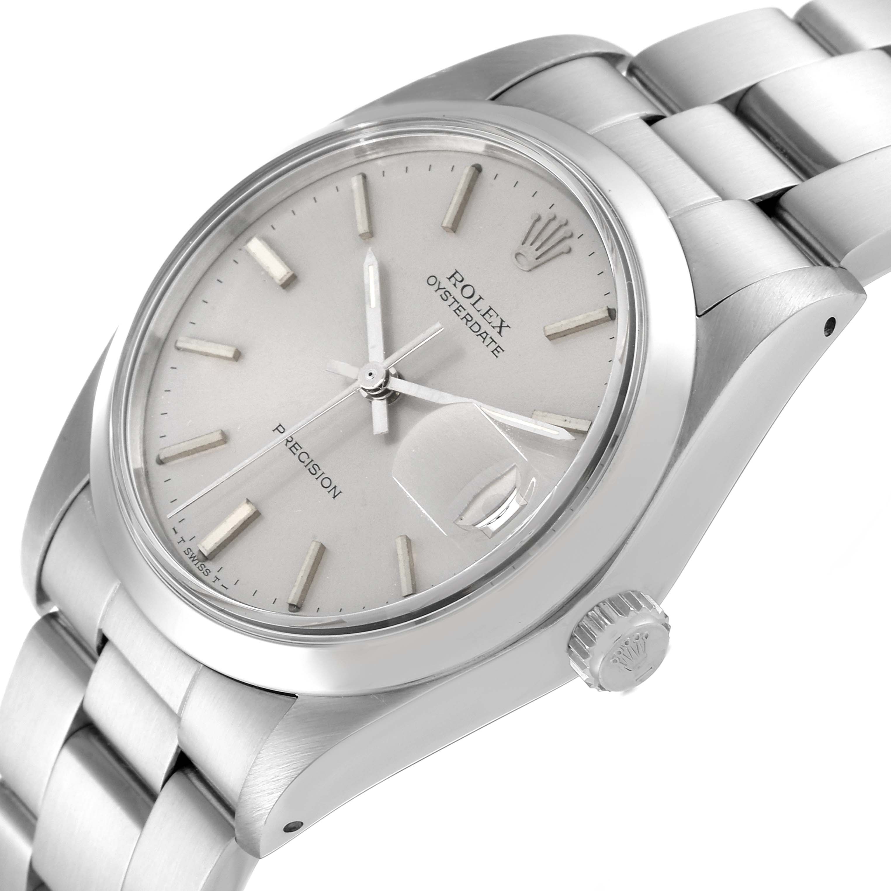 The image shows a close-up side angle of a Vintage Collection Rolex Oysterdate watch, highlighting the dial, bracelet, crown, and case.