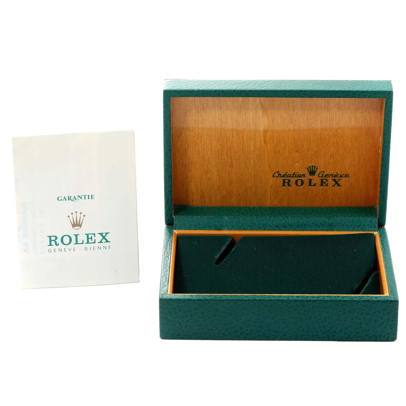 This image shows the open box and guarantee booklet for a Rolex Vintage Collection 6694 Men's Stainless Steel Silver Dial 6694 Men's Stainless Steel Silver Dial model.