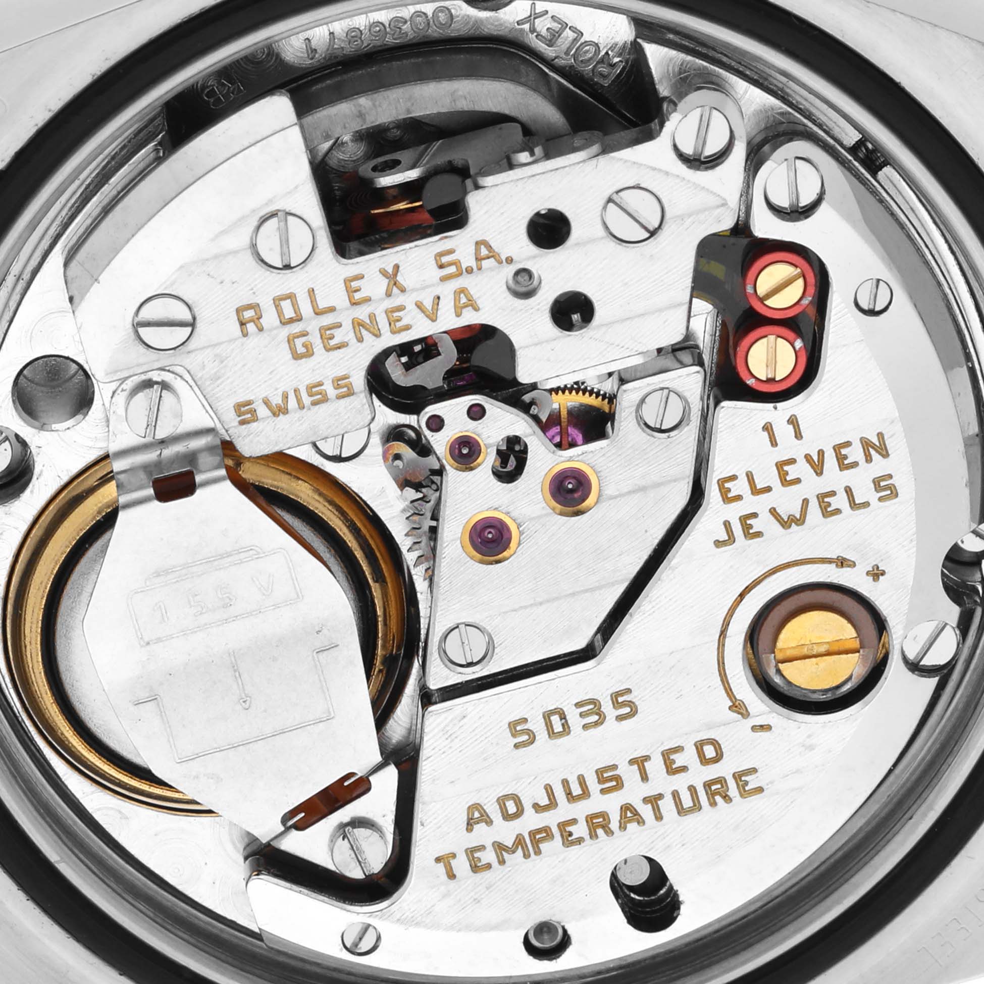 The image shows the movement of the Rolex Oysterquartz 17014 Men's Stainless Steel Silver Dial 17014 Men's Stainless Steel Silver Dial watch from a top-down angle, highlighting its intricate components.