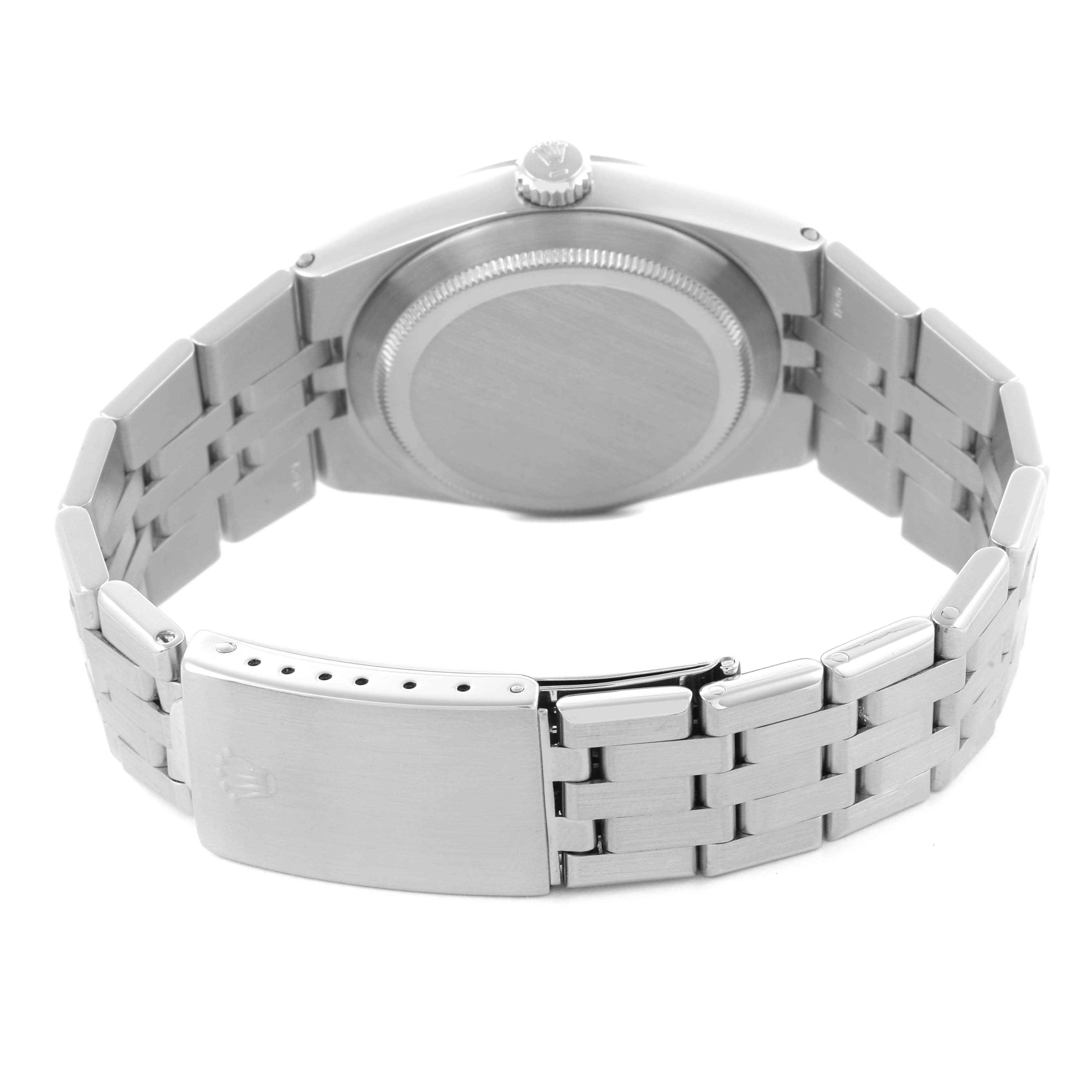 The image shows the back view of a Rolex Oysterquartz 17014 Men's Stainless Steel Silver Dial 17014 Men's Stainless Steel Silver Dial watch displaying its case back, bracelet, and clasp.