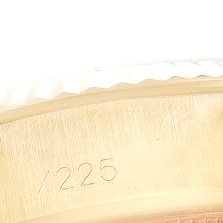 The image shows a close-up of the engraved case side of a Rolex President 69178 Women's Yellow Gold Champagne Dial 69178 Women's Yellow Gold Champagne Dial watch model, highlighting its serial number.