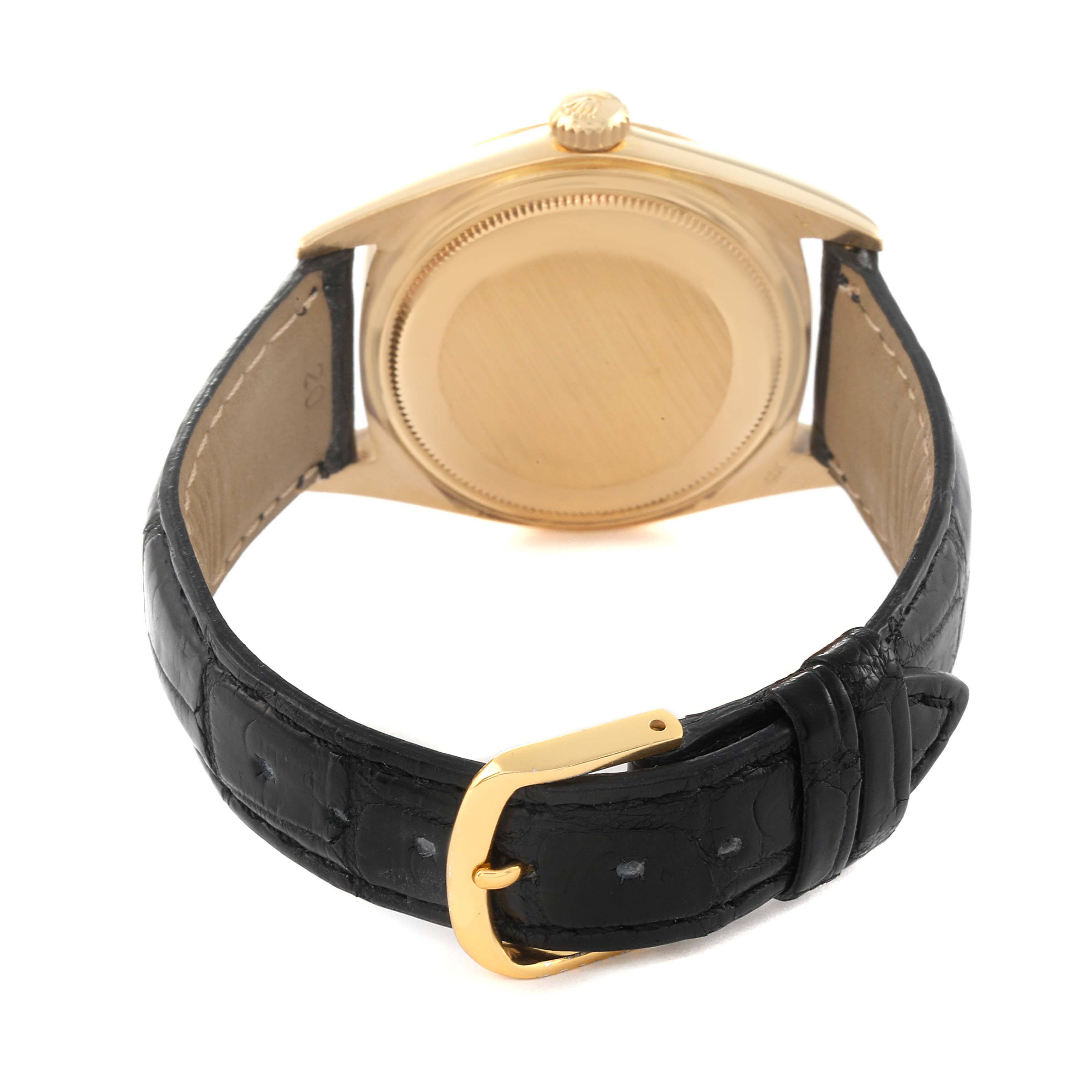 This image shows the back view of a Rolex President 1803 Men's Yellow Gold Champagne Dial 1803 Men's Yellow Gold Champagne Dial model watch, highlighting the back case and leather strap.