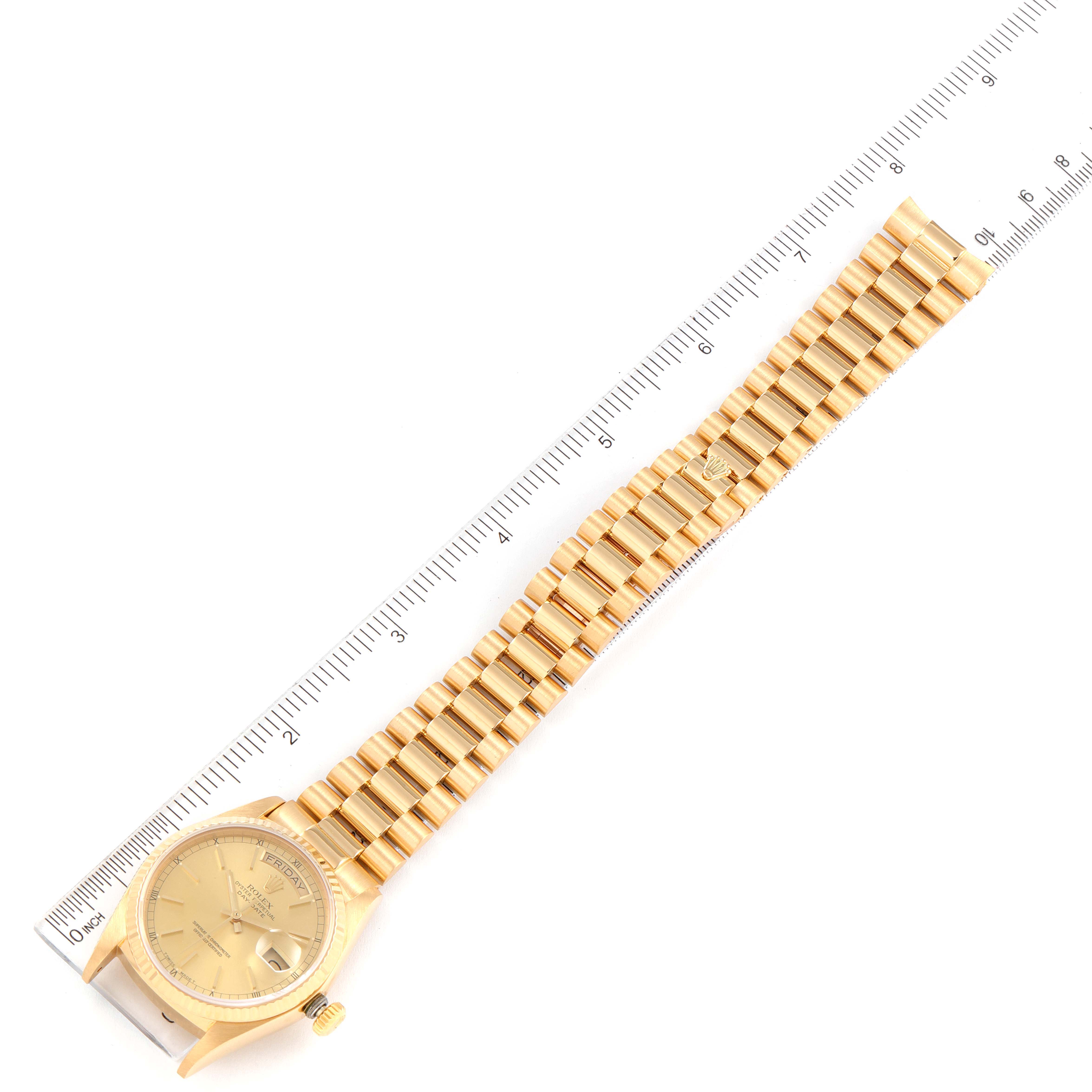 The image shows a Rolex President 18038 Men's Yellow Gold Champagne Dial 18038 Men's Yellow Gold Champagne Dial watch lying flat with a measuring ruler aligned beside it.