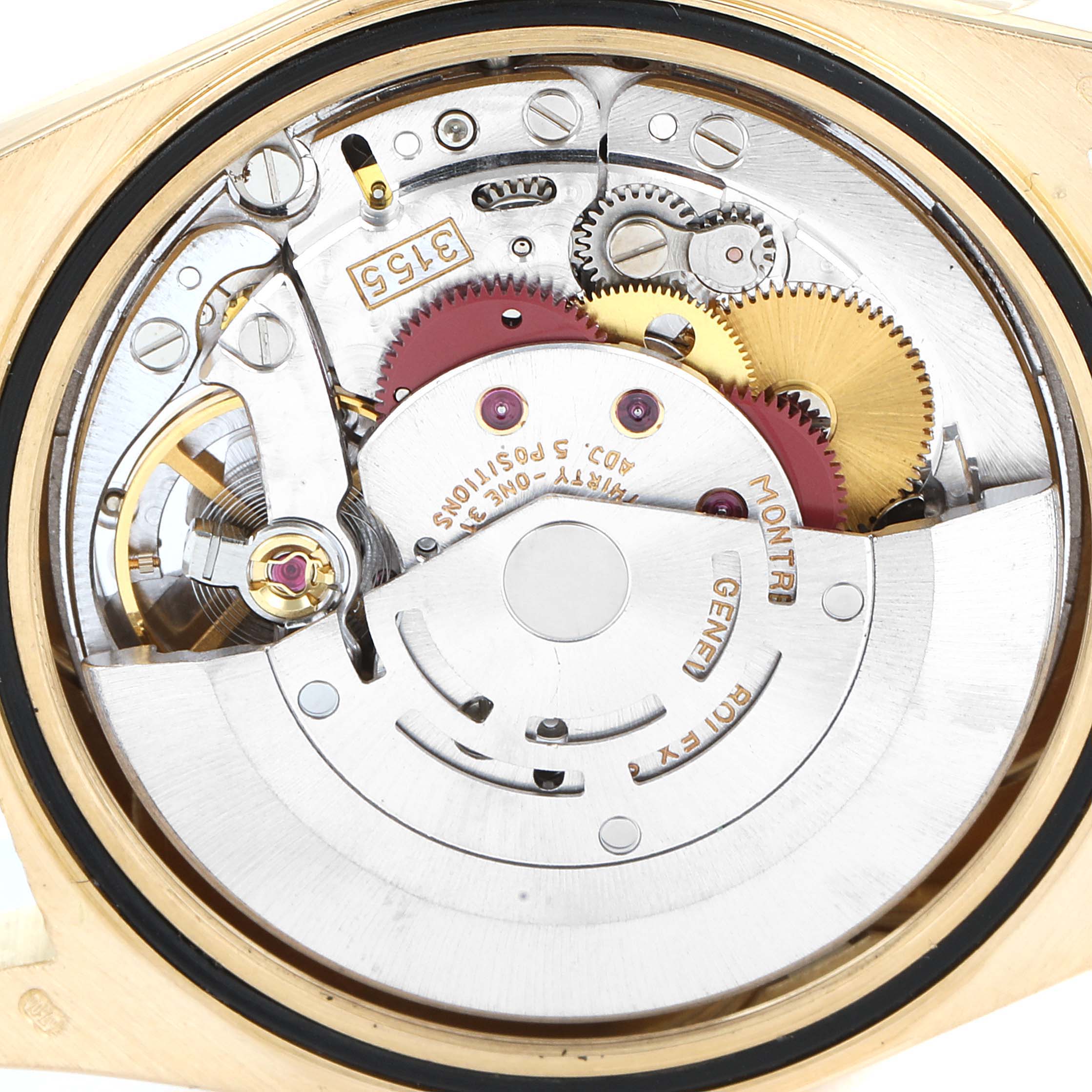 This image shows the intricate internal mechanism of a Rolex President 18238 Men's Yellow Gold Champagne Dial 18238 Men's Yellow Gold Champagne Dial watch from a top-down angle.
