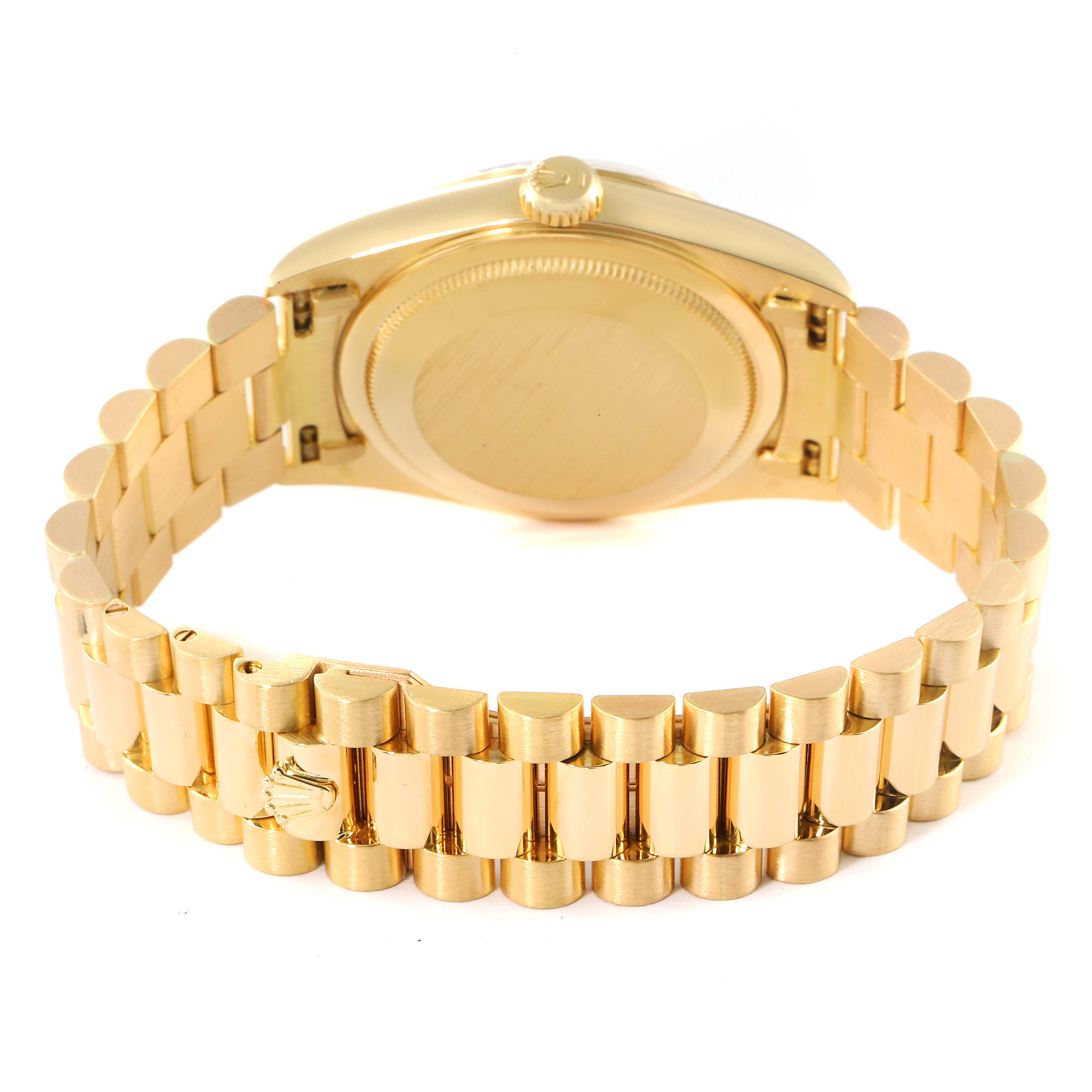 The image shows the back and bracelet of a Rolex President 18238 Men's Yellow Gold Champagne Dial 18238 Men's Yellow Gold Champagne Dial model watch, highlighting its gold color and clasp.