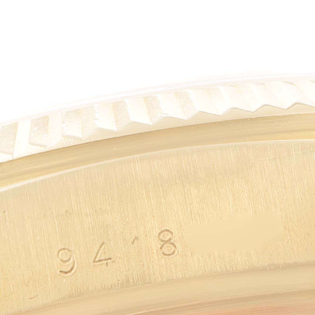 The image shows a close-up of the bezel and case of a Rolex President 18038 Men's Yellow Gold Champagne Dial 18038 Men's Yellow Gold Champagne Dial model watch.