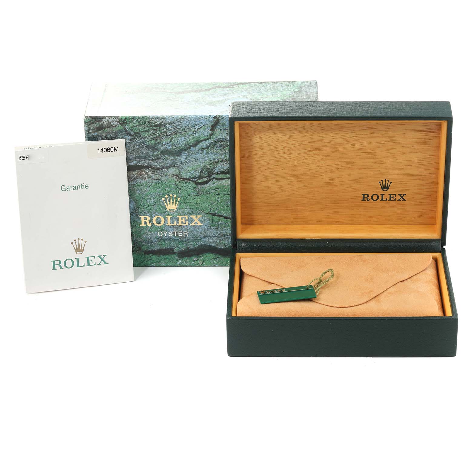 This image shows the packaging and accessories of a Rolex Submariner 14060M Men's Stainless Steel Black Dial 14060M Men's Stainless Steel Black Dial, including the watch box, outer box, and warranty booklet.