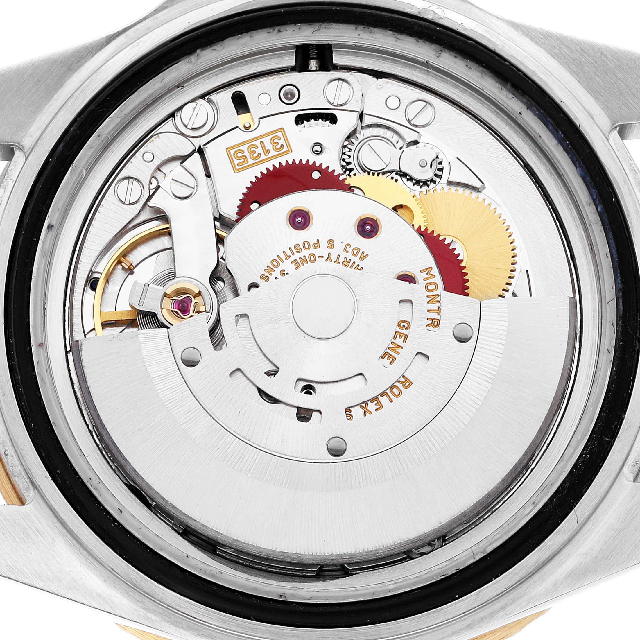 This image shows the detailed internal mechanism of a Rolex Submariner 16613 Men's Steel and Gold (two tone) Blue Dial 16613 Men's Steel and Gold (two tone) Blue Dial watch from a back angle.