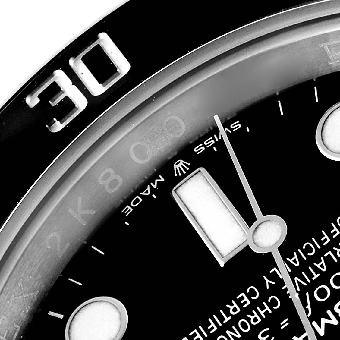 This close-up shows the bezel, hour hand, and part of the dial of the Rolex Submariner 126610 Men's Stainless Steel Black Dial 126610 Men's Stainless Steel Black Dial watch at an oblique angle.