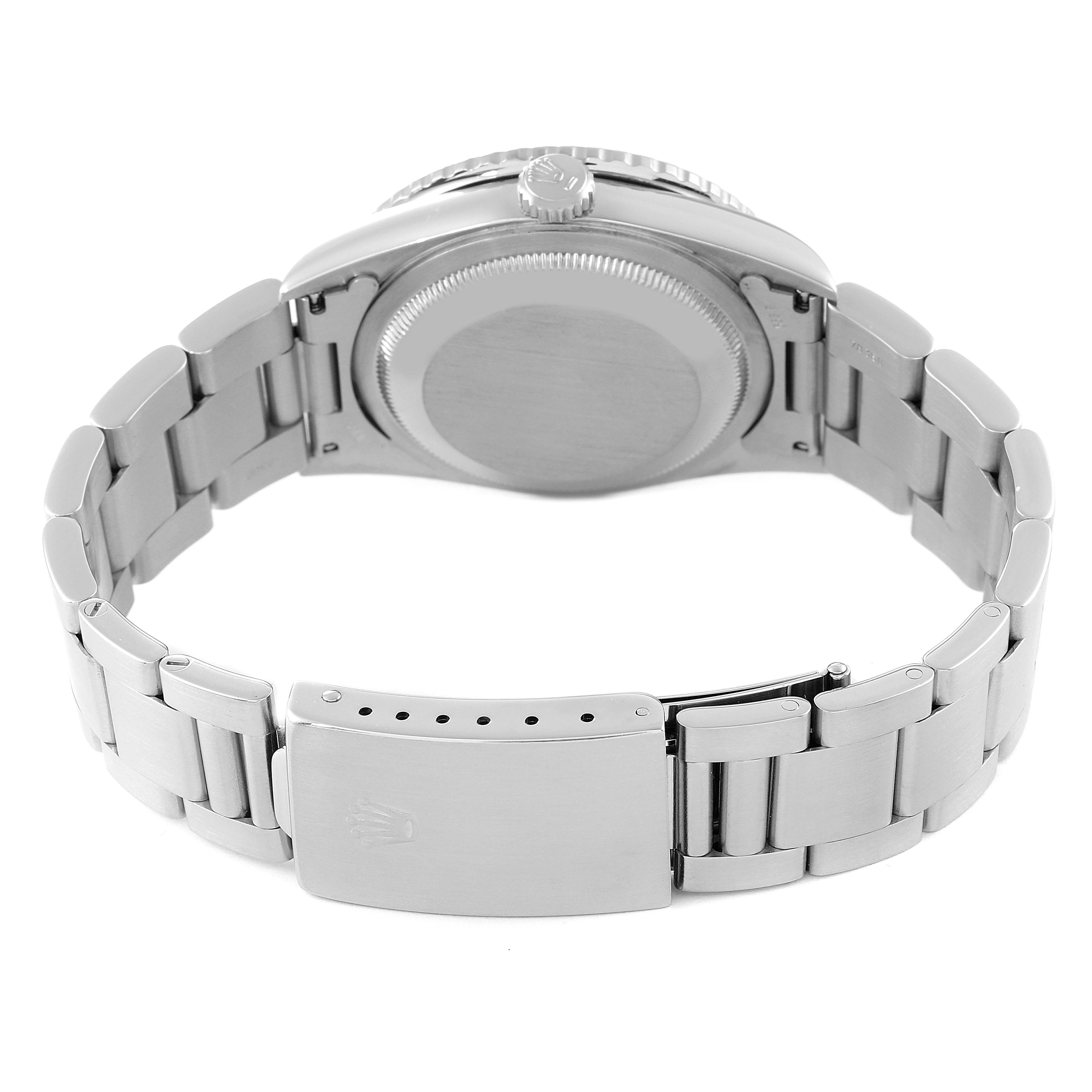 The image shows the back view of a Rolex Turn-o-Graph 16264 Men
s Stainless Steel Silver Dial 16264 Men
s Stainless Steel Silver Dial watch, highlighting its case back, crown, and bracelet with clasp.