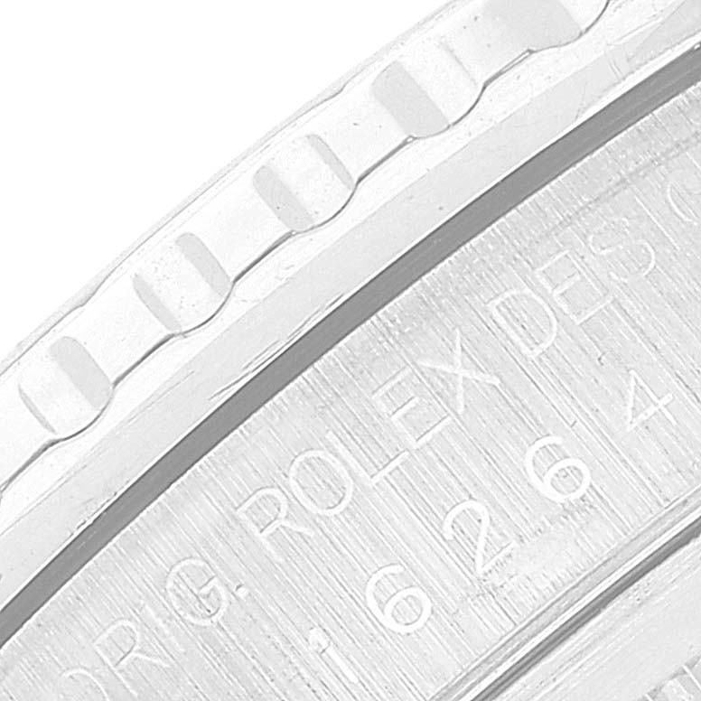 Close-up of the Turn-o-Graph Rolex showing part of the watch bezel and engraved lettering on the case.