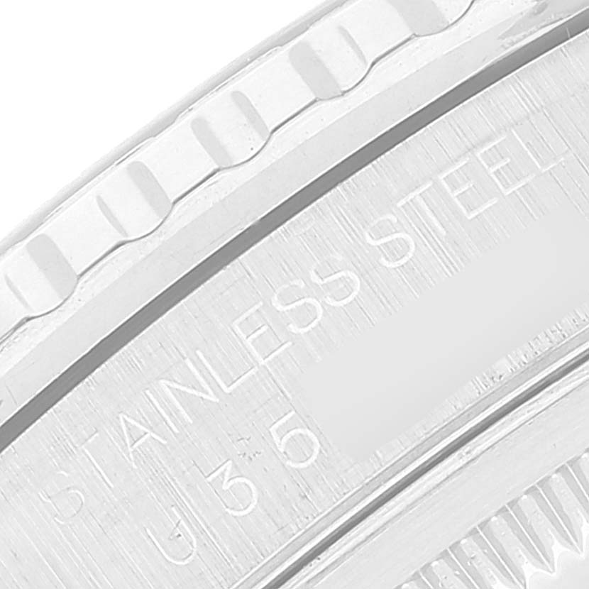 This close-up image of the Rolex Turn-o-Graph 16264 Men
s Stainless Steel Silver Dial 16264 Men
s Stainless Steel Silver Dial watch shows the stainless steel bezel and engravings.