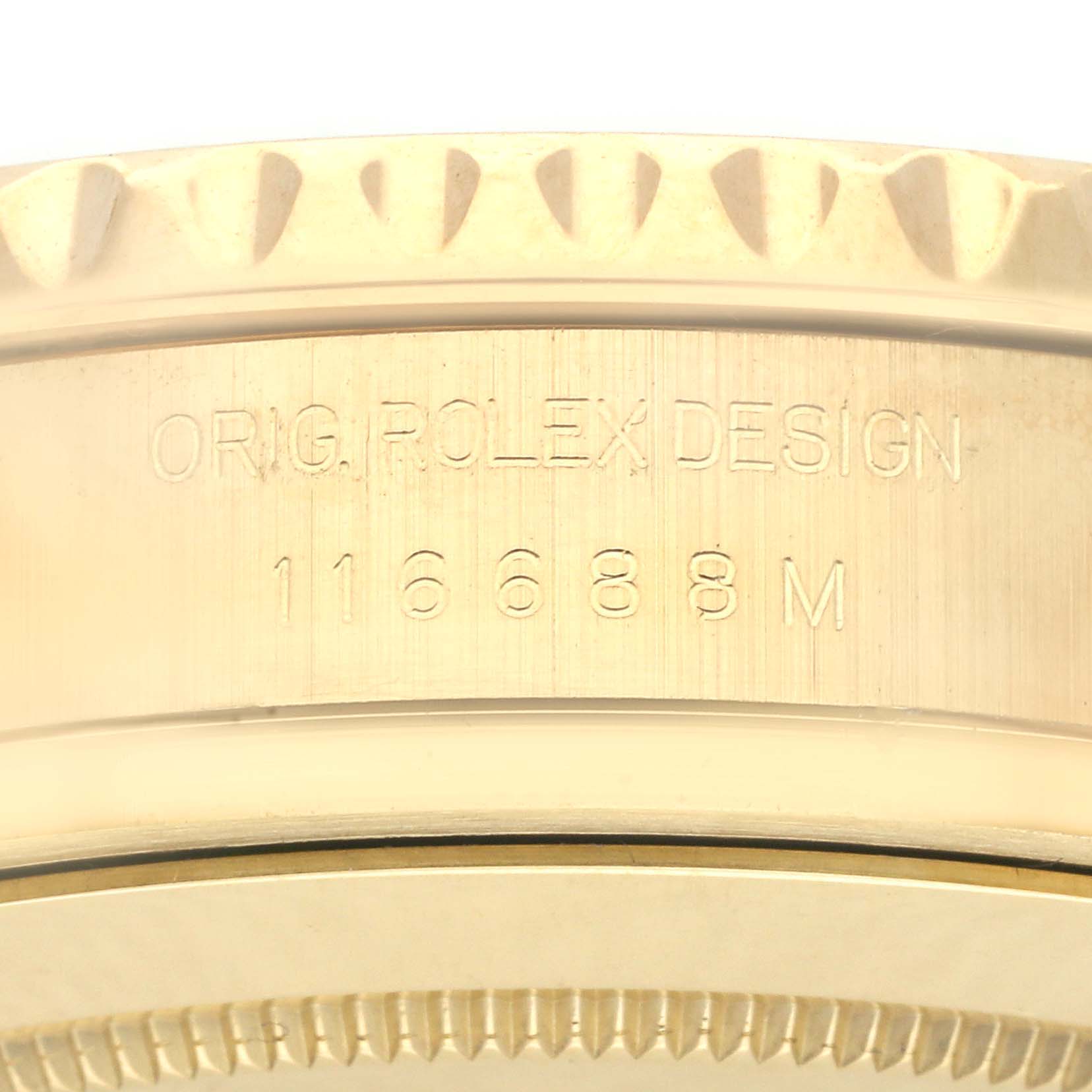 The image shows a close-up of the side engraving and part of the bezel on a Rolex Yacht-Master 116688 Men's Yellow Gold White Dial 116688 Men's Yellow Gold White Dial watch.