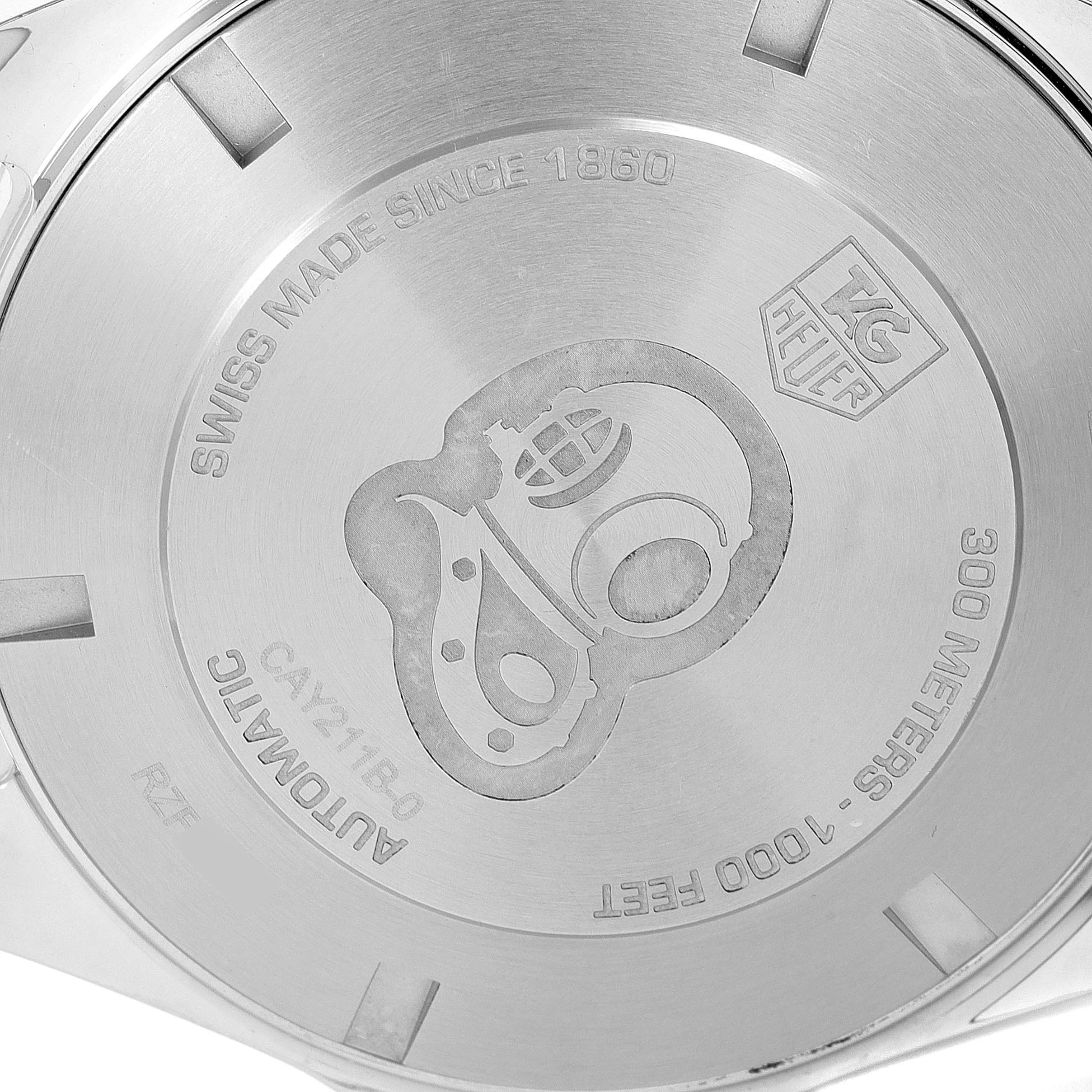 The image shows the back case of the Tag Heuer Aquaracer CAY211B.BA0927 Men's Stainless Steel Blue Dial CAY211B.BA0927 Men's Stainless Steel Blue Dial model watch, highlighting its engraving and specifications.