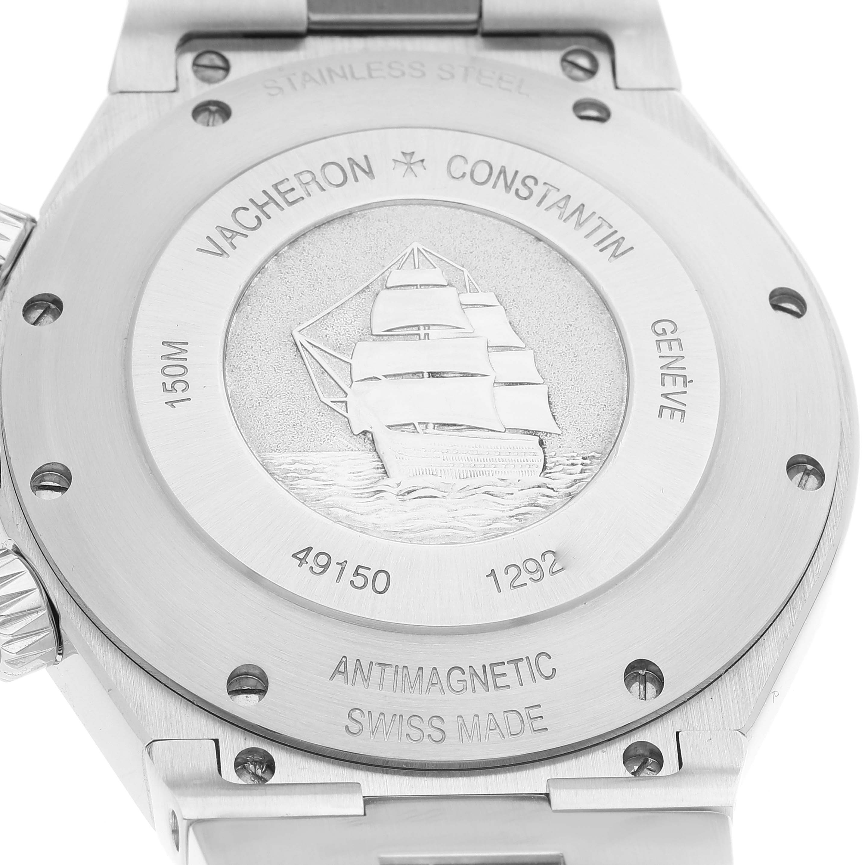 The image shows the case back of the Vacheron Constantin Overseas 49150/B01A-9095 Men
s Stainless Steel Silver Dial 49150/B01A-9095 Men
s Stainless Steel Silver Dial watch, featuring an engraved ship motif and various inscriptions.