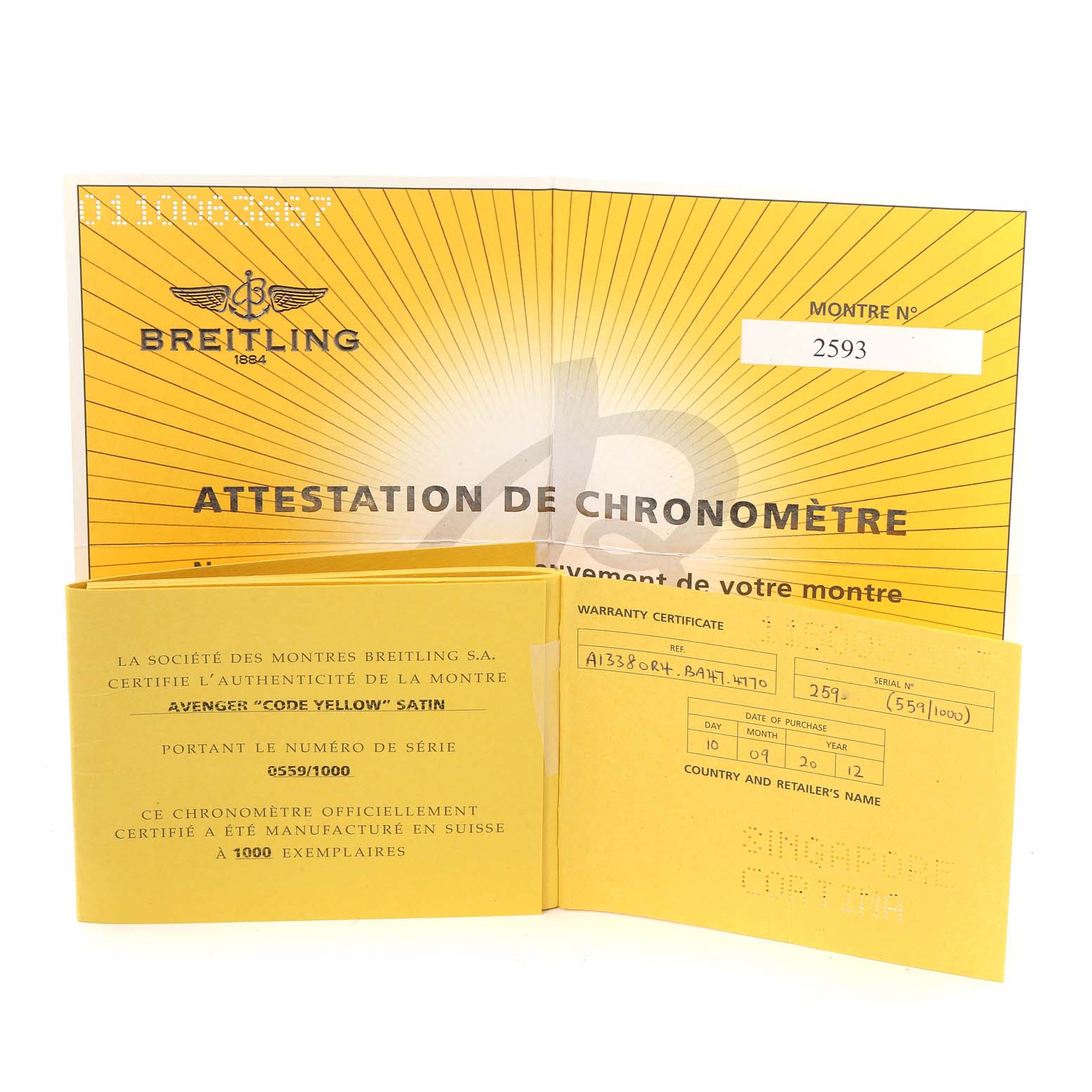 The image shows the warranty certificate and chronometer attestation cards for a Breitling Avenger A13381 Men's Stainless Steel Black Dial A13381 Men's Stainless Steel Black Dial model watch.